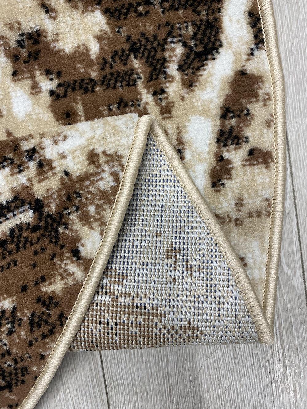 Contemporary Kazakh Rug in Modern Design

Type: Rug
Shape: Oval
Material: Polypropylene
Pattern: Abstract
Dimensions: 100 x 150 cm (approximately 3.3 x 4.9 ft)
Country of Manufacture: Kazakhstan
Color: Beige and Brown
Weight: Lightweight
Condition: