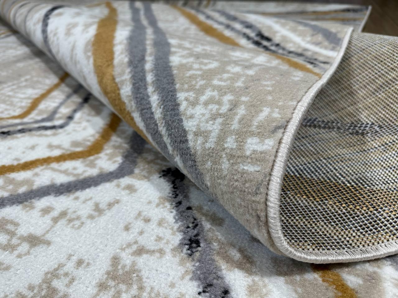 Kazakh Contemporary Rug in Modern Design

Type: Rug
Shape: Rectangular
Material: Polypropylene and Jute
Pattern: Abstract, Modern
Dimensions: 140 x 200 cm (approximately 4.6 x 6.6 ft)
Country of Manufacture: Kazakhstan
Color: Beige and Gray
Weight: