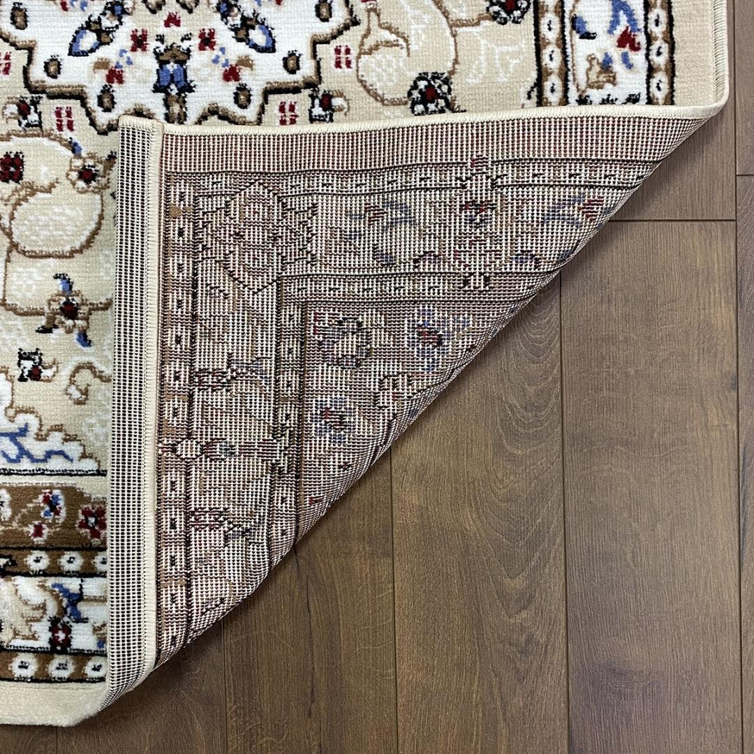 Contemporary Kazakh Rug in Tabriz Style

Type: Rug
Shape: Rectangular
Material: Polypropylene
Pattern: Classic Floral
Dimensions: 150 x 230 cm (approximately 4.9 x 7.5 ft)
Country of Manufacture: Kazakhstan
Color: Beige
Weight: Lightweight
This