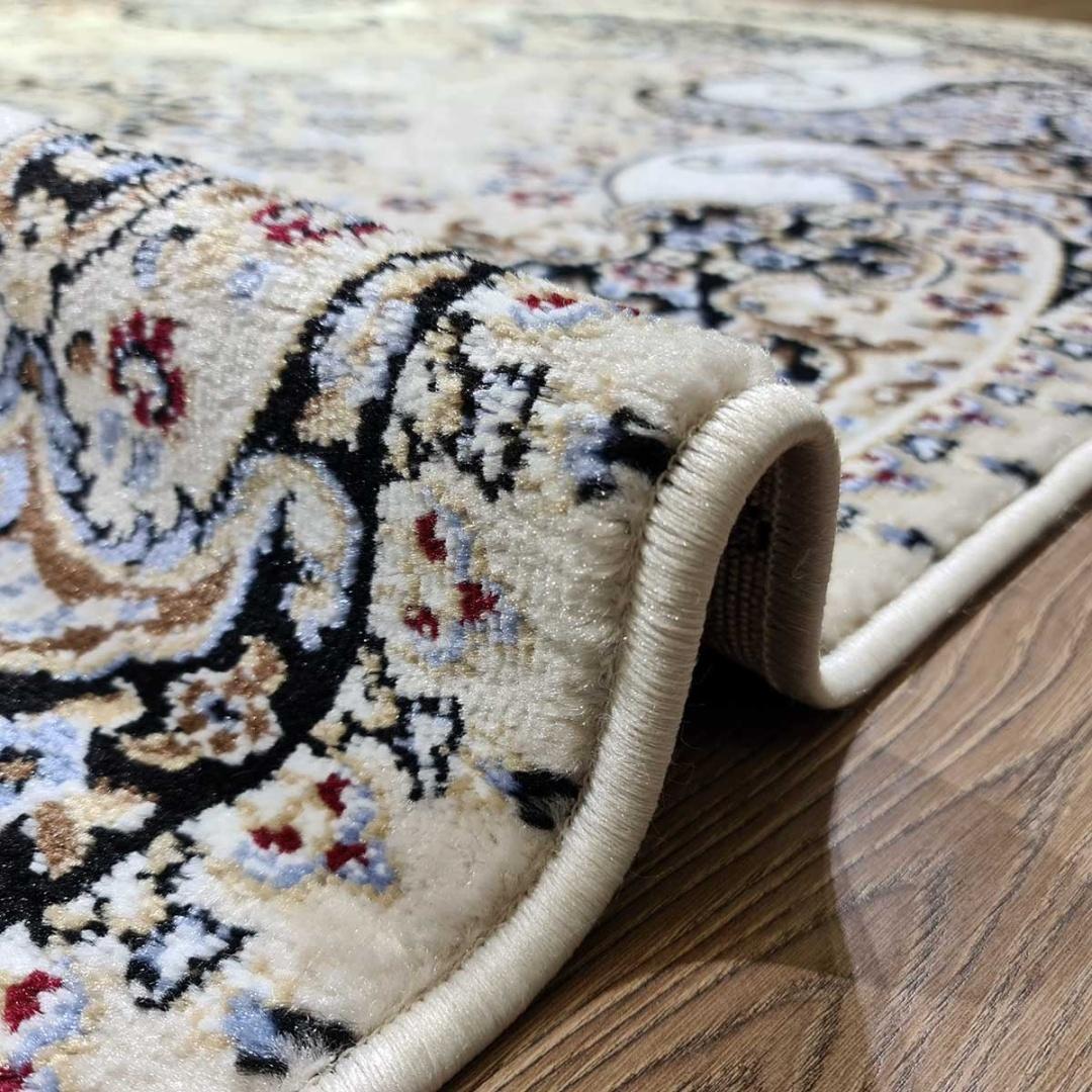 This stunning Kazakh contemporary rug in a Tabriz style features a classic Eastern pattern and is machine-made from a blend of high-quality polypropylene and jute. The elegant beige color enhances any room, offering a timeless and sophisticated