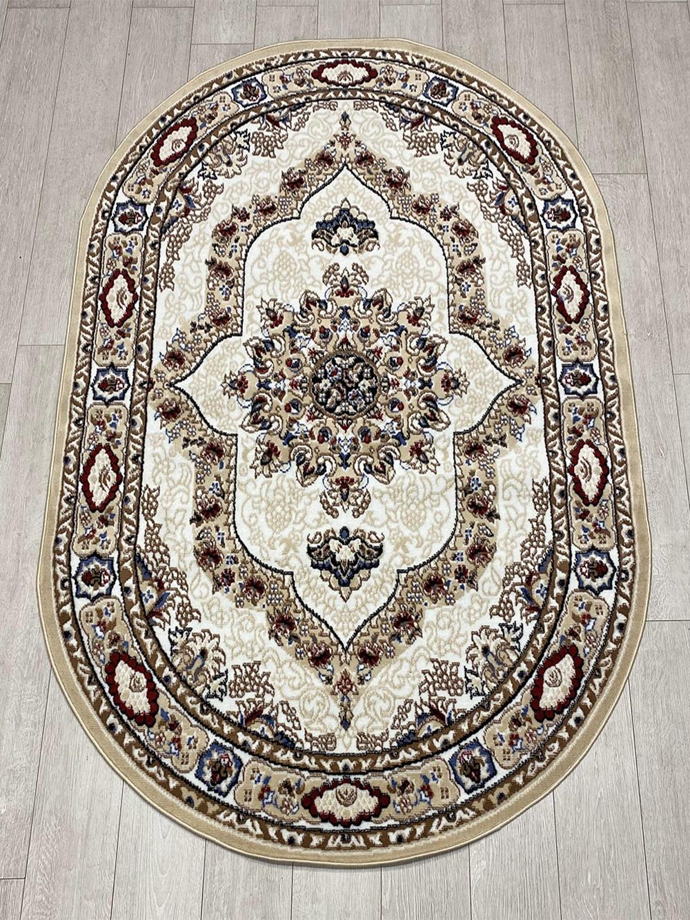 This elegant Kazakh rug in a Tabriz design features a classic pattern and is machine-made from high-quality polypropylene. With its soft white and beige colors, this lightweight rug is both stylish and durable, perfect for adding a touch of