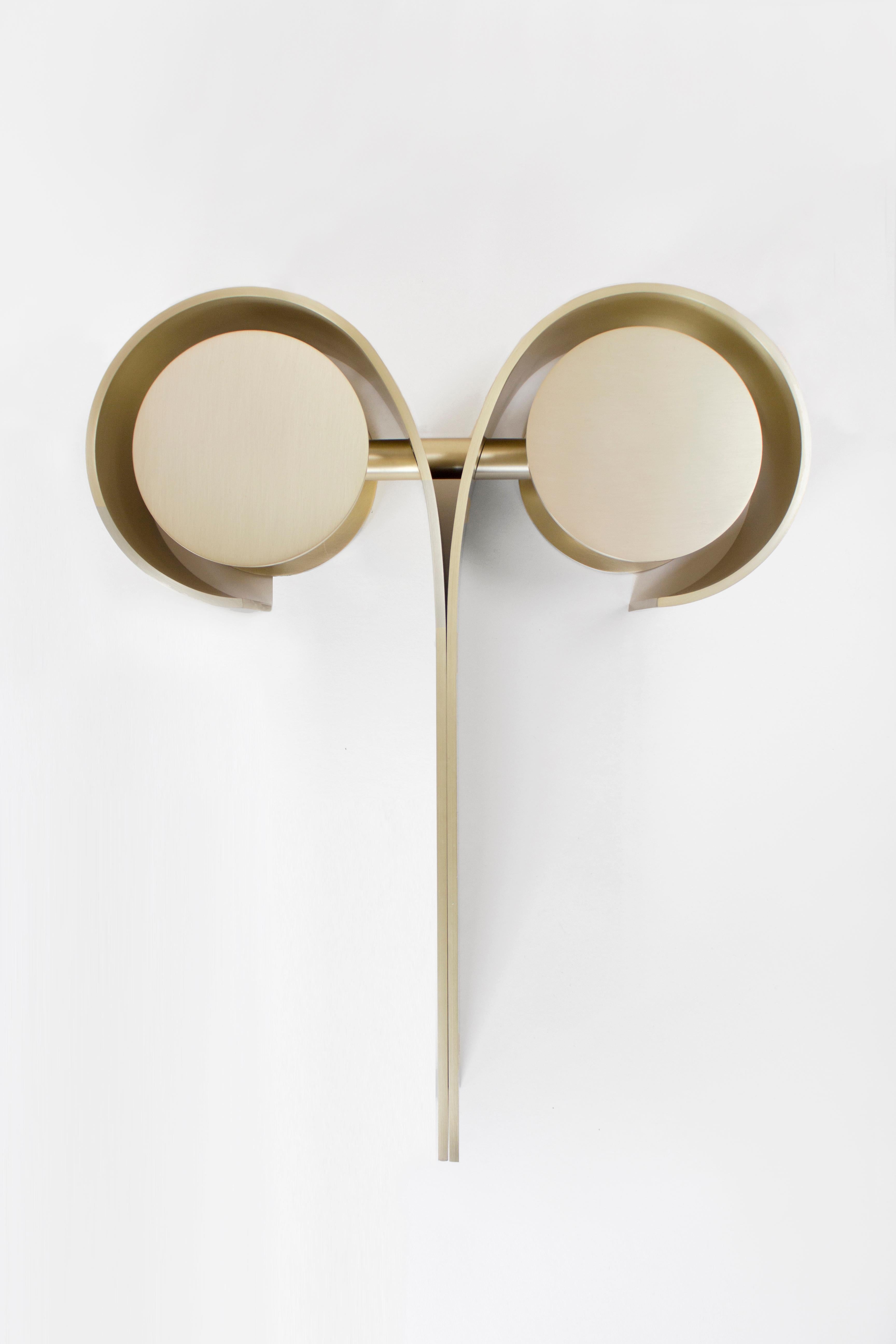 Material Lust [American, b. 1981, 1986]
Khnum Sconce, 2015 
Shown in plated brushed brass and blackened brass. 
Measures: 21