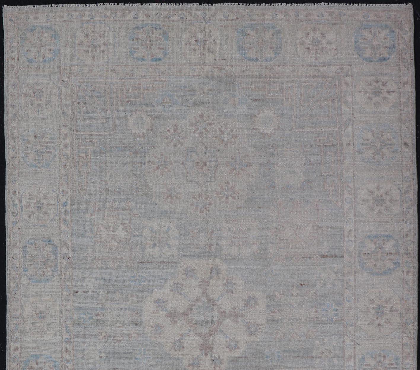 Afghan Contemporary Khotan with Circular Medallions in Light Colors For Sale