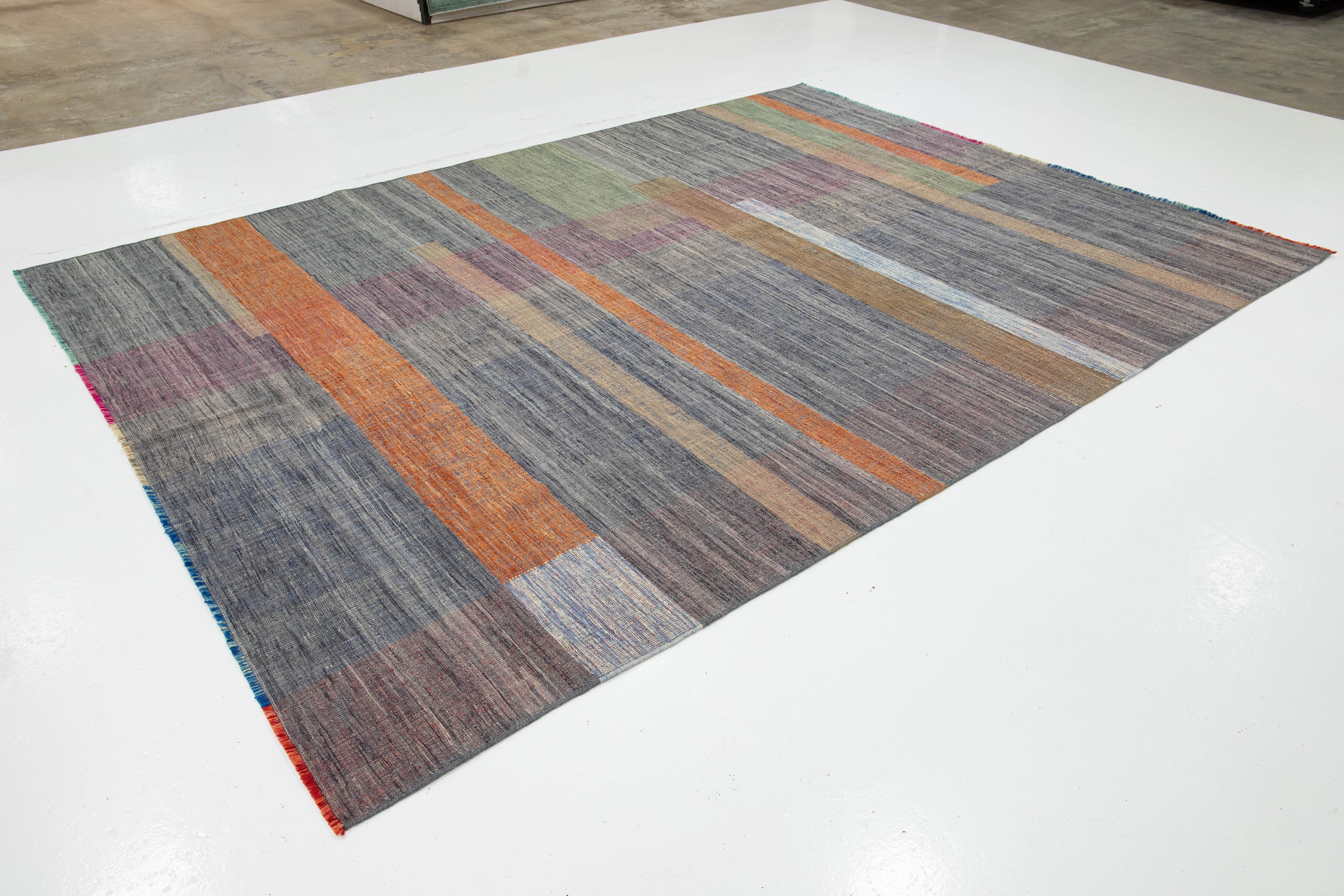 Indian Contemporary Kilim Flatweave Wool Rug Featuring a Vibrant Geometric Design For Sale
