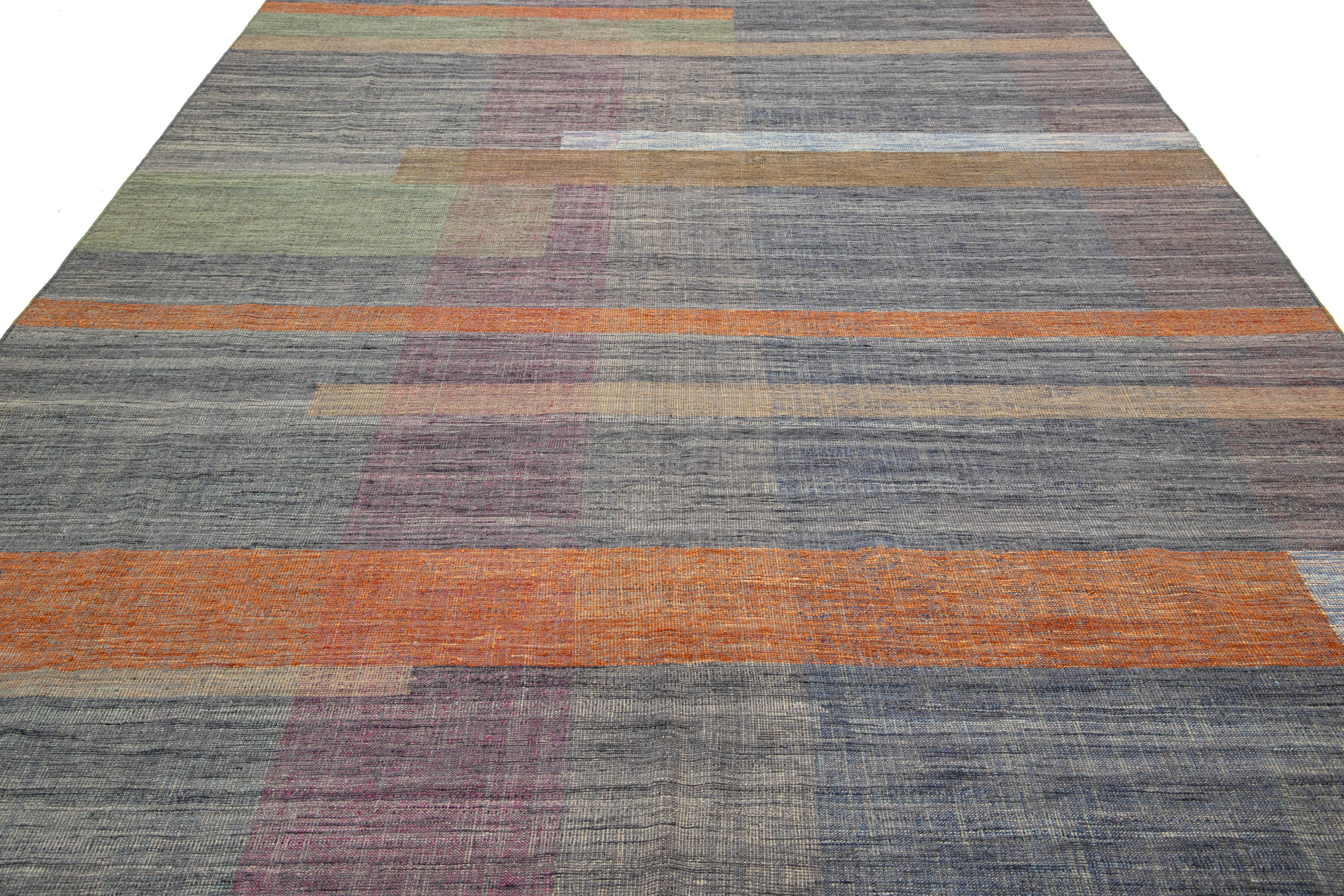 Contemporary Kilim Flatweave Wool Rug Featuring a Vibrant Geometric Design For Sale 1