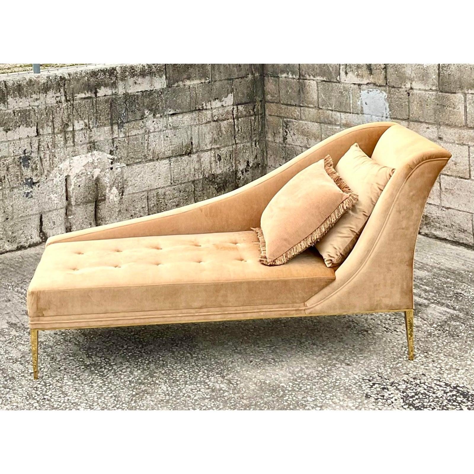 Spectacular Contemporary tufted velvet chaise lounge. Made by the iconic Koket group. This chase is the coveted Envy design in a pale peach color. Polished brass hardware. Acquired from a Palm Beach estate.