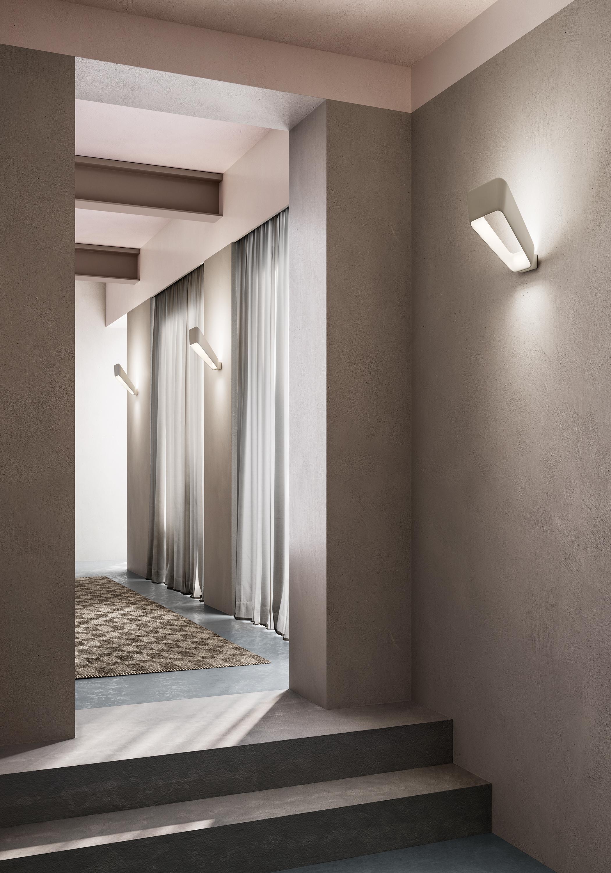 Frame chrome finish

Frame surrounds the light, diffusing it on the walls and enhancing it. Austere architectural design for a linear and compact wall light. Purity, solidity and lightness are the result of an extensive research project and