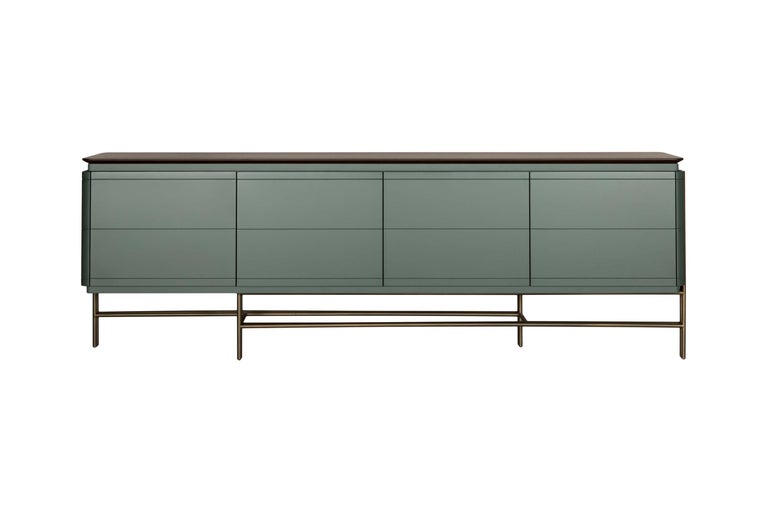 Sideboard with 4 doors, inside shelf and metal base. 
Cabinet is lacquered with top veneer walnut, metal base in epoxy powder. 
Custom sizes and finishes upon request.
Top is also offered in ceramic or marble upon request.
100% European