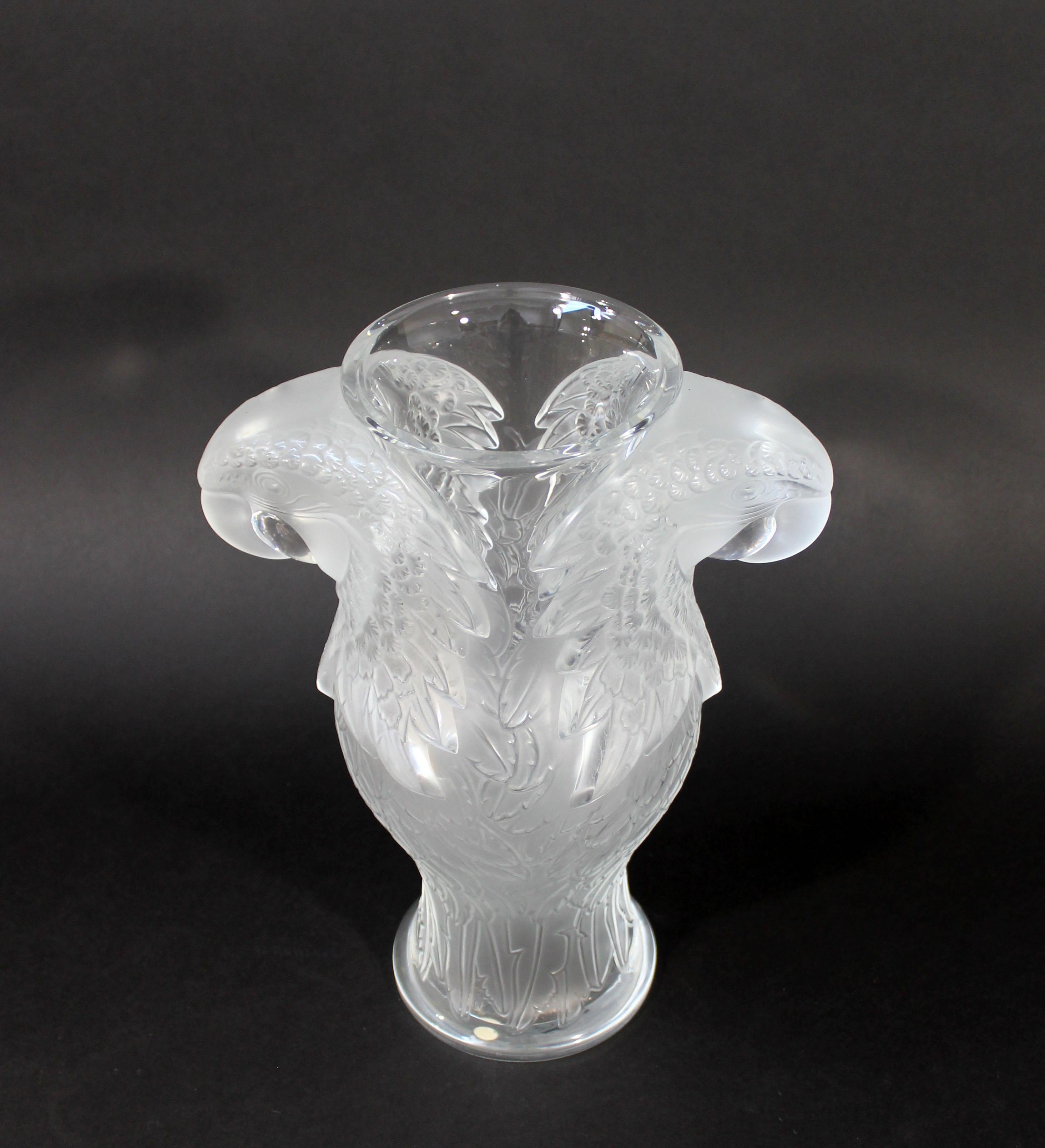 For your consideration is a wonderful, Lalique crystal macaw vase, signed and numbered 51/99. In excellent condition. The dimensions are 9