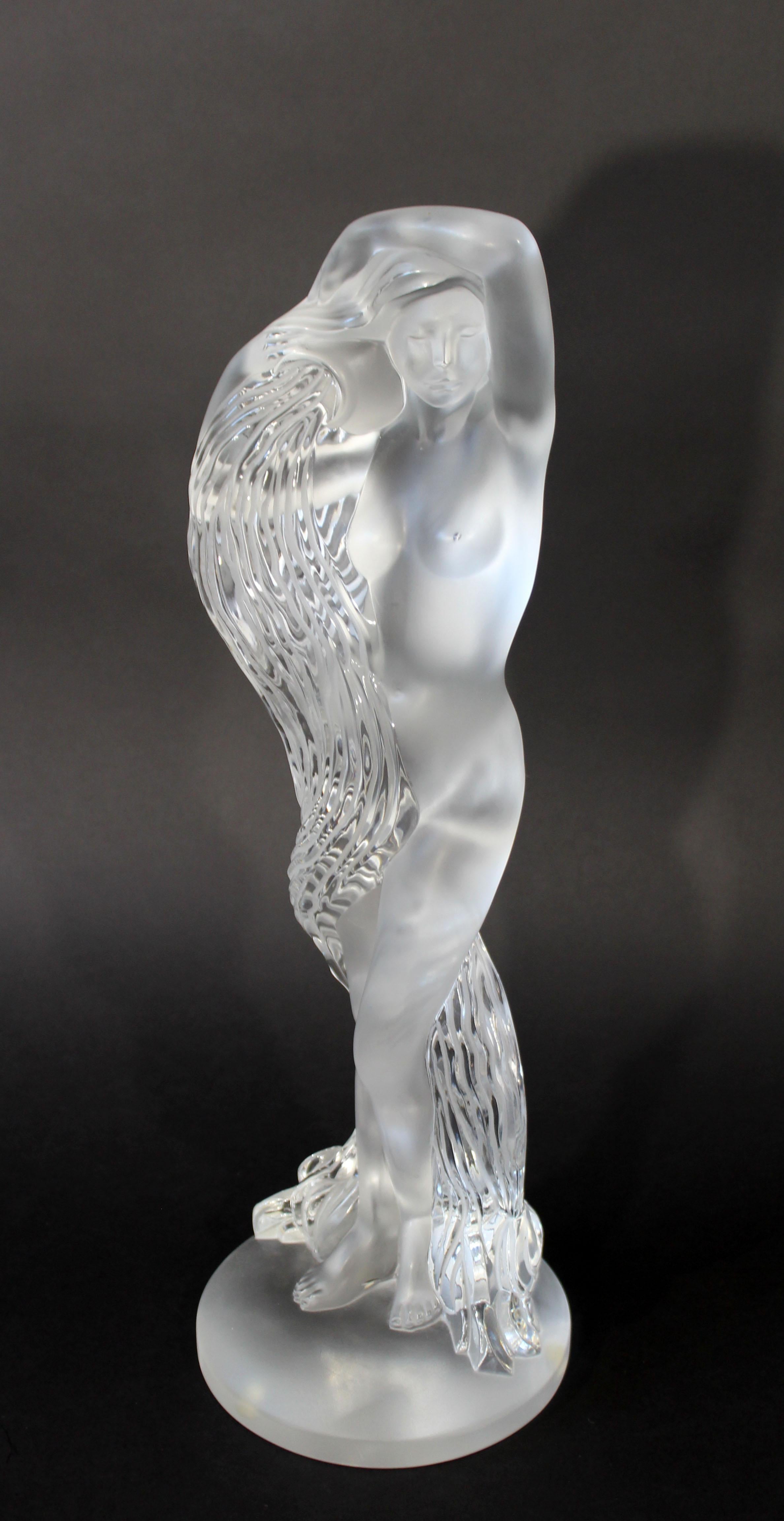 For your consideration is a stunningly beautiful, Lalique crystal table sculpture of a nude, water nymph, signed and numbered 139/999. In excellent condition. The dimensions are 6