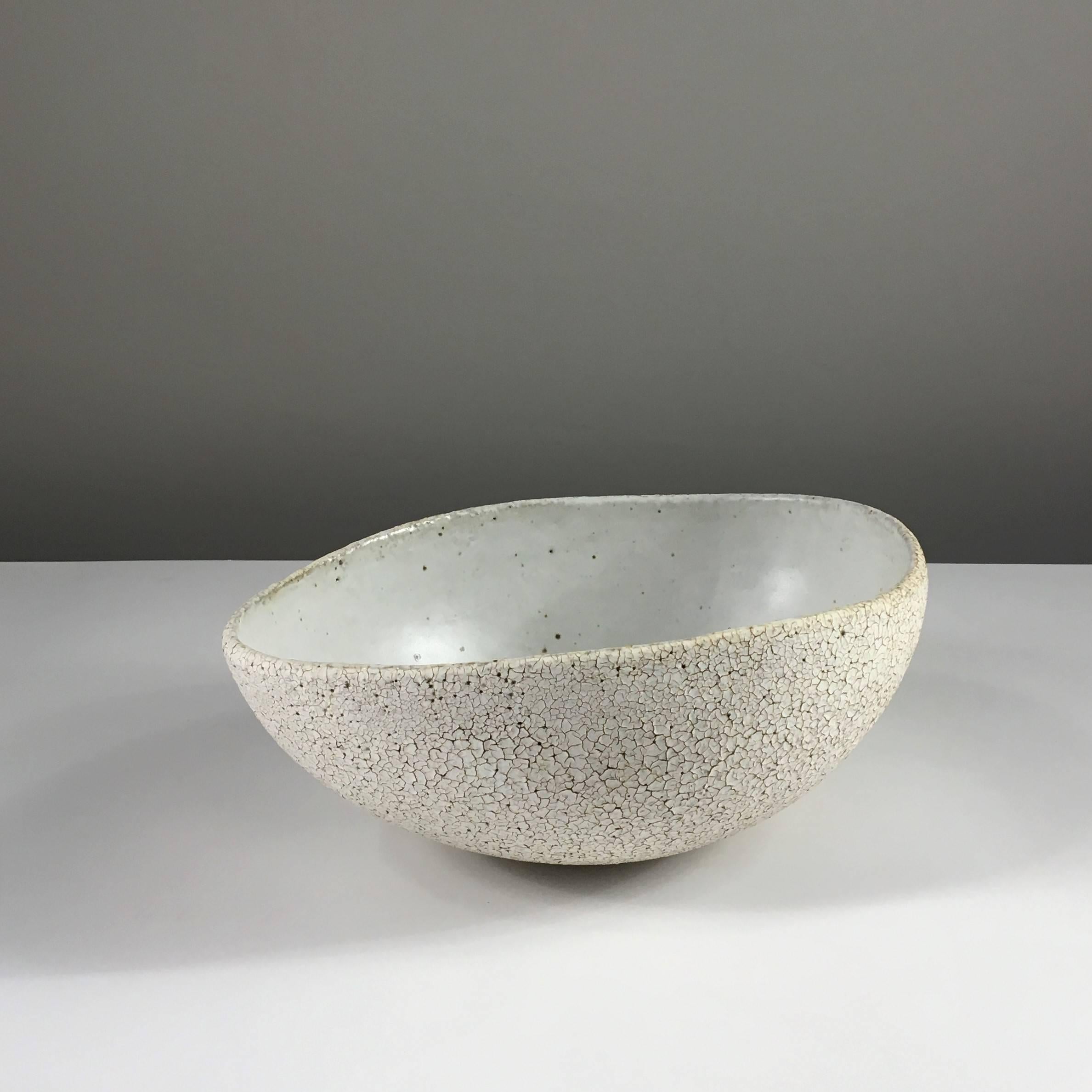Contemporary ceramic artist Yumiko Kuga's glazed stoneware large bowl no. 119 is part of her Crackle Series. All of the pieces in this series are hand-built and 100% handmade so they are one-of-a-kind and thus vary slightly from one another. All