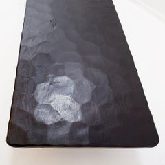 Contemporary Large coffee table in black hammered wood