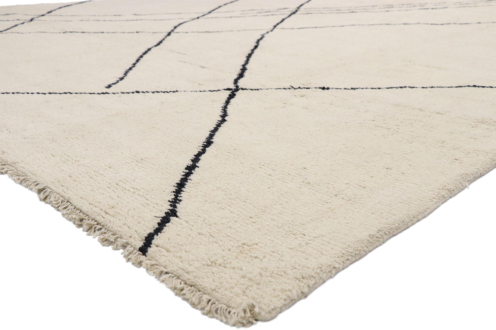 80543 Large Neutral Moroccan Rug, 10'00 x 13'08.
Minimalist Shibui meets Wabi-Sabi in this hand knotted wool Moroccan rug. The perfectly imperfect lattice and earthy neutral colors woven into this piece work together to provide a feeling of cozy