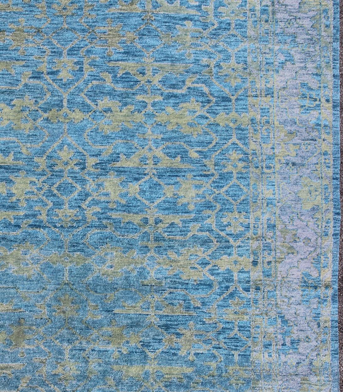 Large Modern Oushak design with contemporary colors Keivan Woven Arts, OB-9723983, Contemporary Oushak Design rug-in green, blue and silver gray. 

Measures: 12'0 x 15'0

This hand-knotted Oushak rug is rendered in beautiful blue background, silver