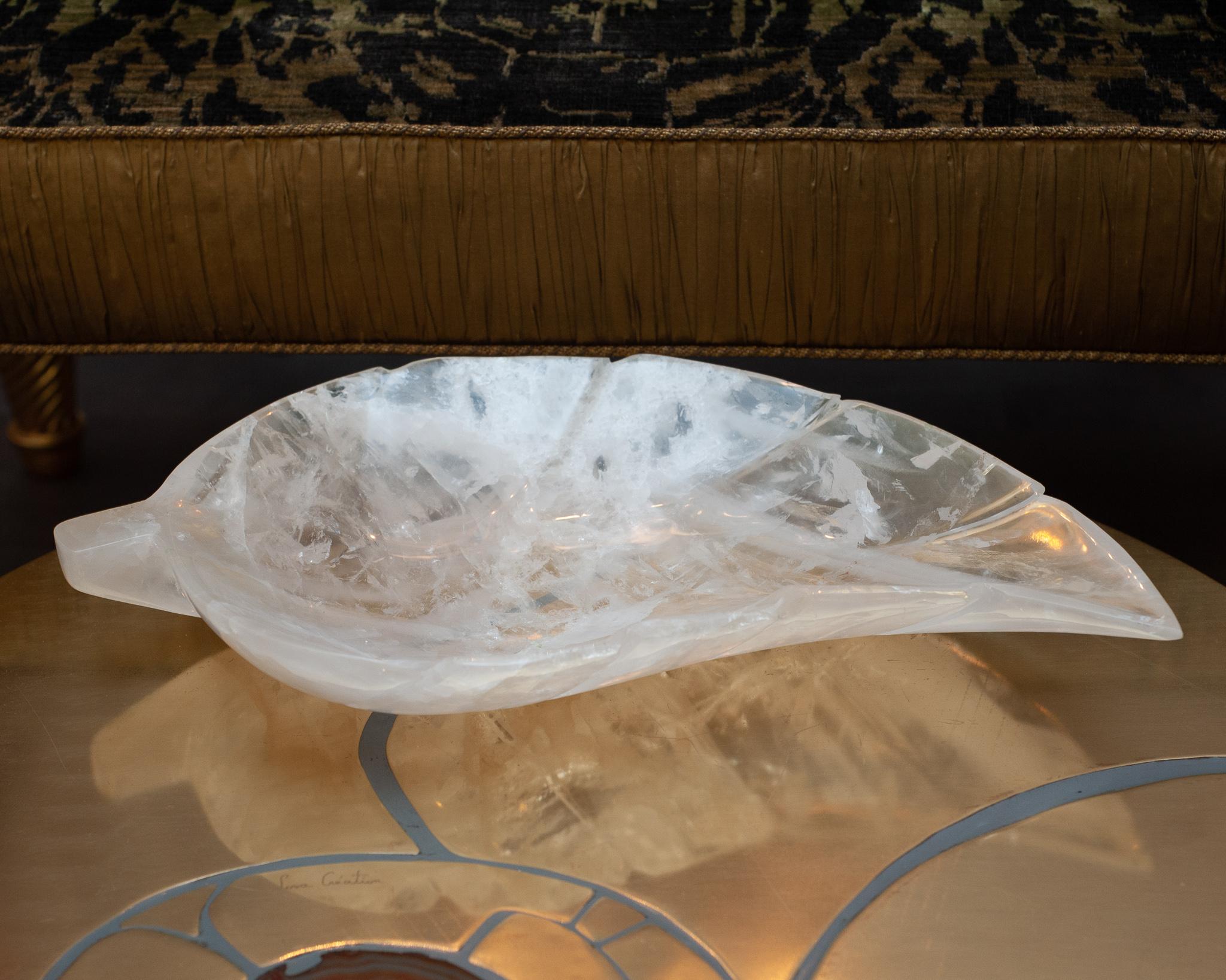 A beautiful large scale hand carved leaf tray in natural, clear rock crystal quartz. Finely carved from a super clear quality of rock crystal and polished to a brilliant high gloss finish. A stunning accessory for any tabletop. Hand carved in Minas