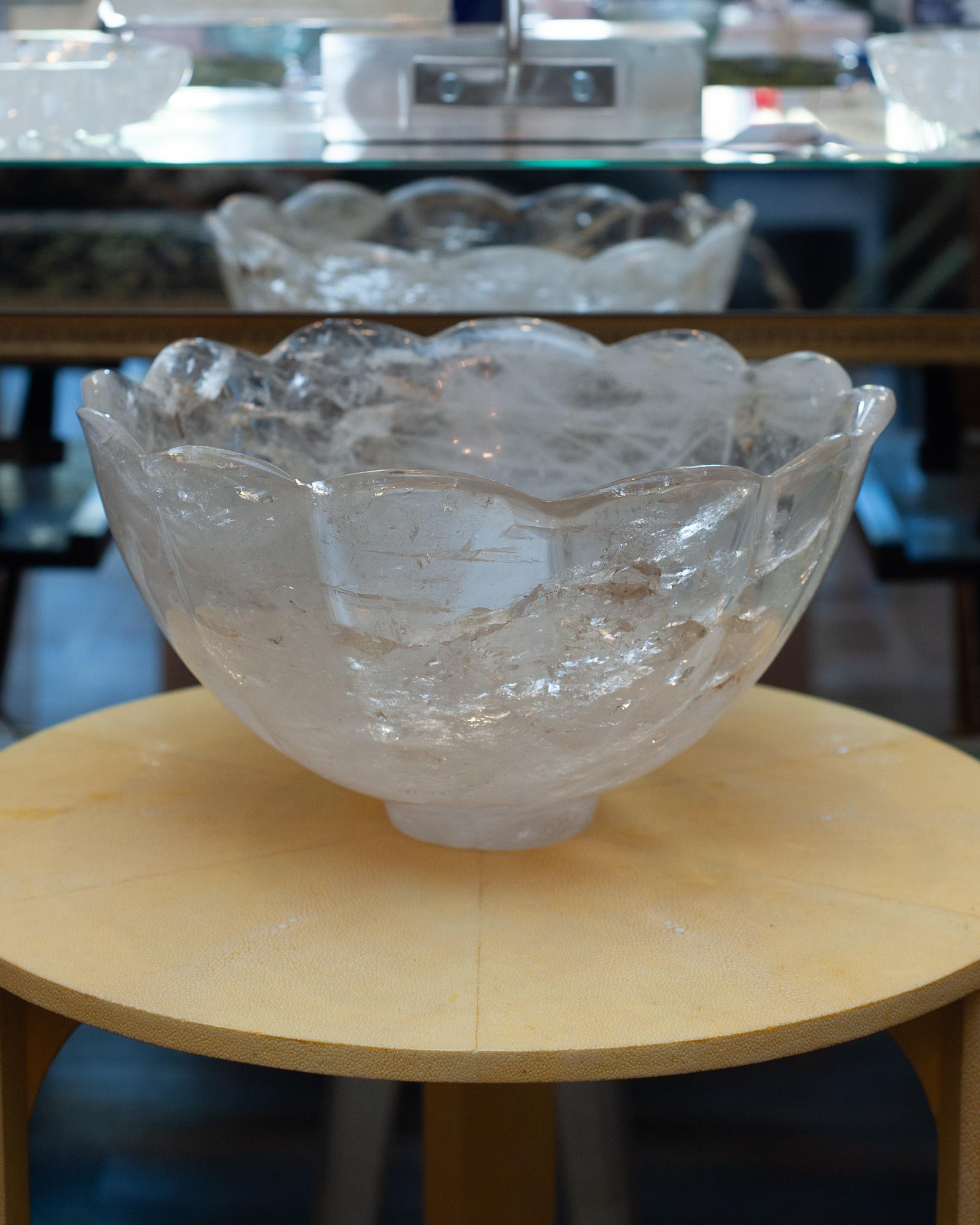 Bring the healing energy of rock crystal into your home with this large scale beautiful carved bowl. This carved Rock Crystal bowl with scalloped edges was sourced in Paris. The quality of the carving as well as its size, indicate its rarity. It is