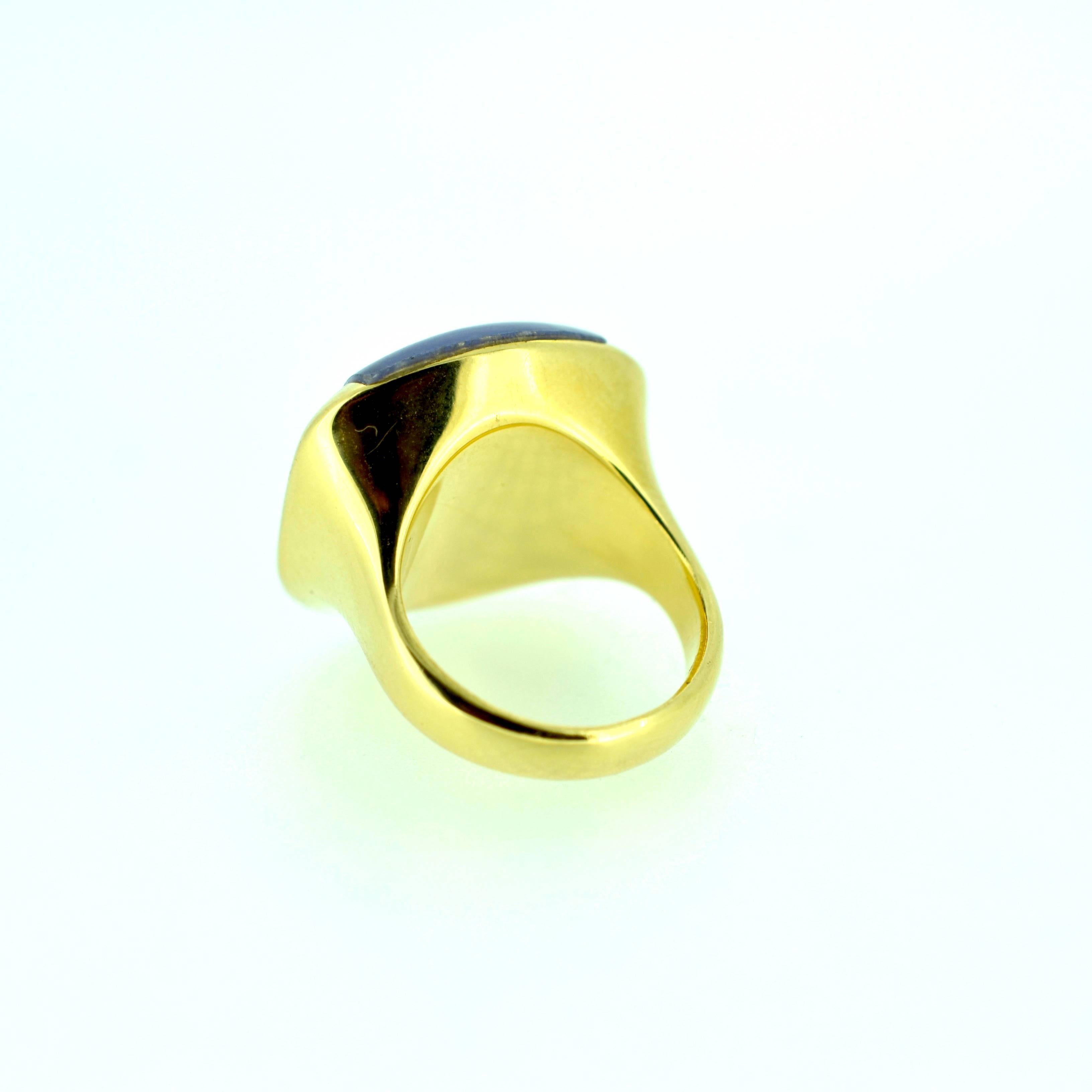 Lavender Jade 18kt yellow gold ring: Contemporary design, wax carved and cast in solid 18kt yellow gold base and shank. Jade is softly domed23X16mm soft rectangular shape and bezel set on the sides. Ring weighs 14.3 DWT.