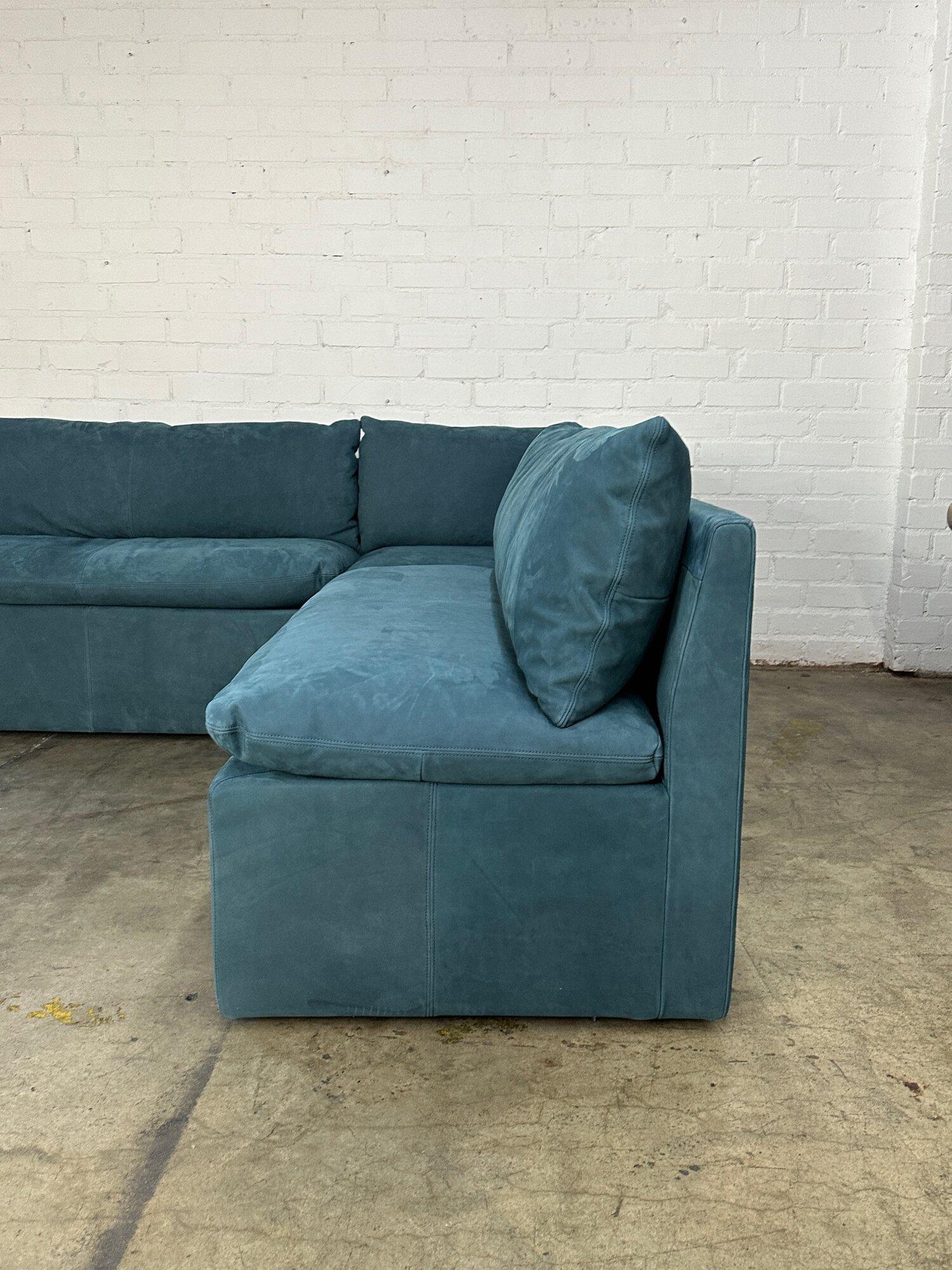 W84 D84 H30 SW73 SD18 SH18

Aria Leather Banquette by Sixpenny in the color North Atlantic. Upholstered in suede like nubuck leather in a deep teal. Item is in like new condition with very minimal areas of wear.

