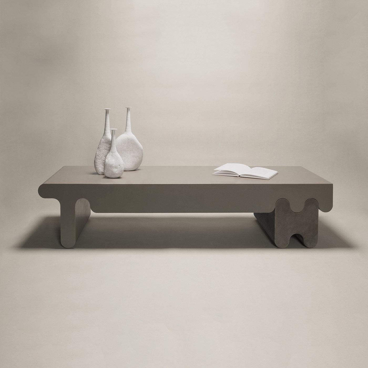 Contemporary leather coffee table - Ossicle by Francesco Balzano for Giobagnara.
The object presented in the image has following finish: F83 stone nappa leather (top) and A24 smoke suede leather (legs).

Part of an exquisite series of benches,
