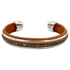 Contemporary Leather Lined Cuff with Turquoise by Charlie Favour Contemporary Leather Lined Cuff with Turquoise by Charlie Favour