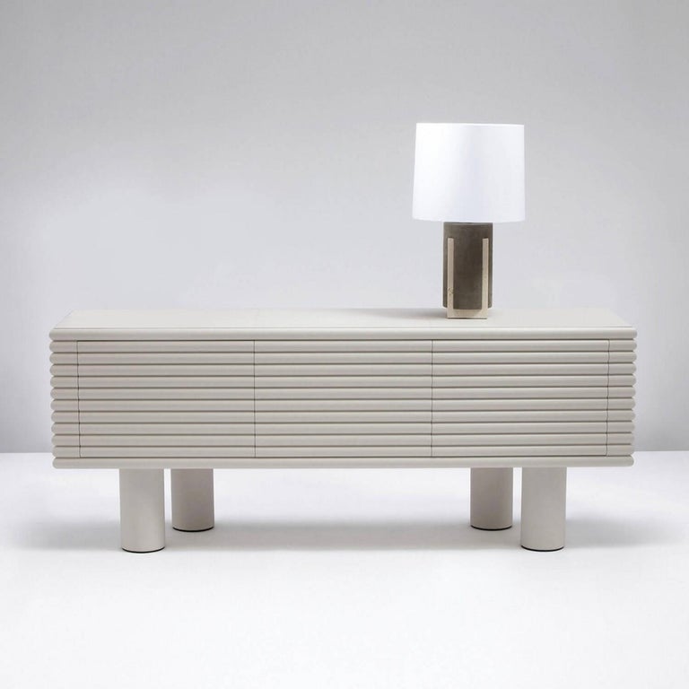 Contemporary leather sideboard scala by Stephane Parmentier for Giobagnara.
Three doors.
The object presented in the image has following finish: F95 off white nappa leather

An interplay of linear planes and perspectives inspired by Italian shoe