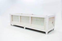 Divano contemporaneo in pelle dal design decostruito