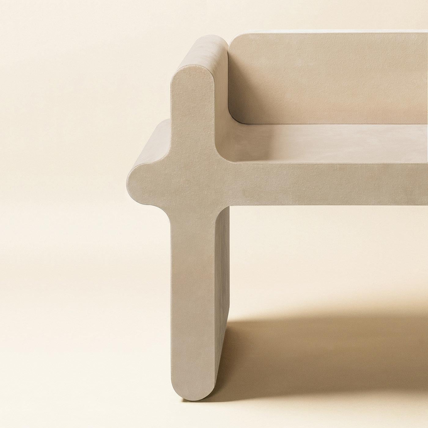 Contemporary suede leather stool - Ossicle N.2 by Francesco Balzano for Giobagnara.
The object presented in the image has following finish: A06 ivory suede leather.

Defined by soft and delicate lines, this chair is superbly upholstered in beige
