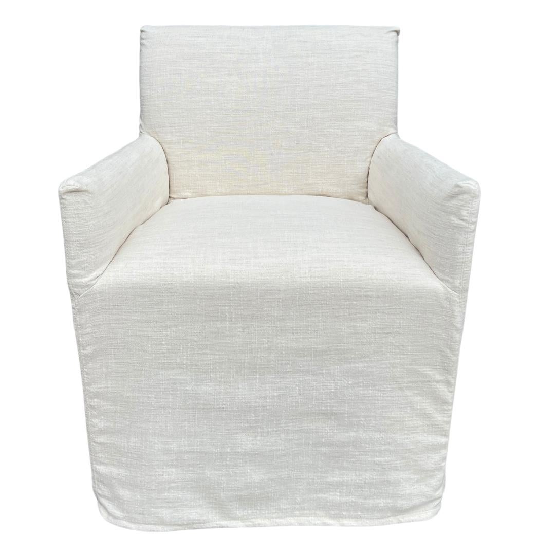 Custom made LEE Industries C1757-41C Slipcover Dining Chair (6 available). These dining chairs are showroom new and have never been used.

This elegant Lee Industries slipcover dining (or desk) chair on casters combines comfort and style with its