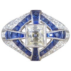 Contemporary Lemon Tinted Diamond and French Cut Sapphire Cross Ring in Platinum Contemporary Lemon Tinted Diamond and French Cut Sapphire Cross Ring in Platinum