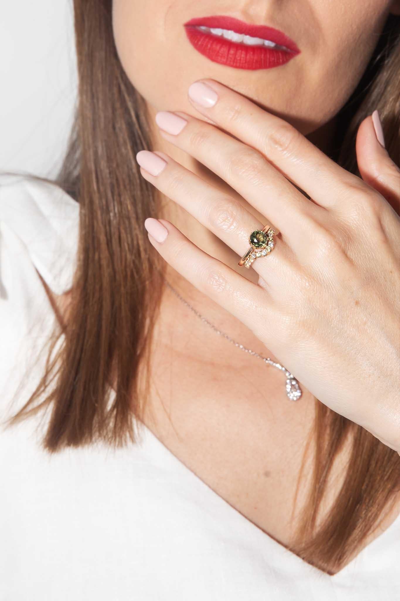 Crafted in 18 carat gold, our Hailey Ring is a darling jewel.  To fit with another or to stand alone she is more then enough.  Embellished with diamonds and peridots she sparks flashes of beaming light.   

The Hailey Ring Gem Details 
The round