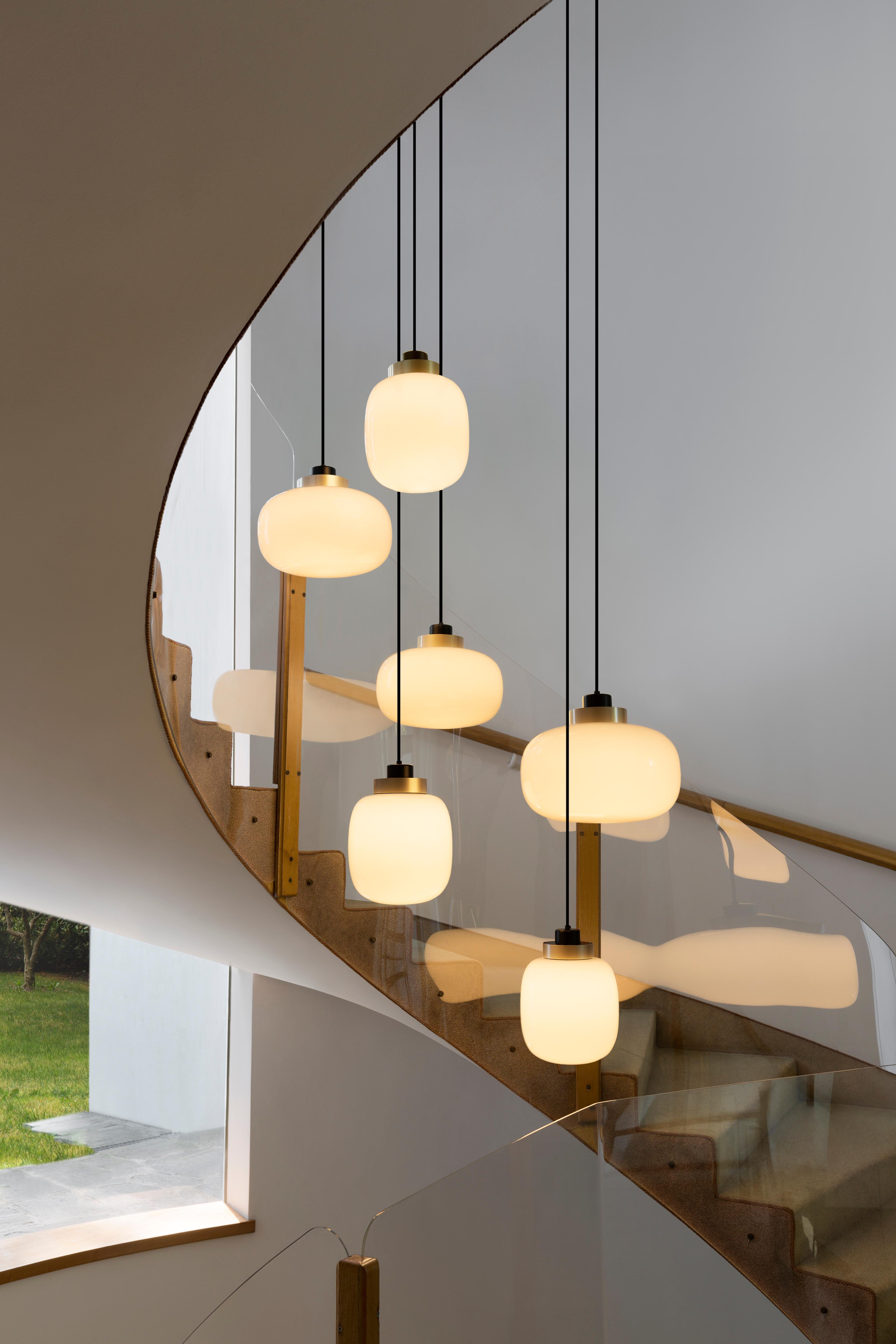 Chandelier Legier by Tooy.
6 Pendants version. (Compliant with US electric system)

Dimensions: 
- Small pendant (x 3 ): height 33 cm x diameter 25 cm. 
- Large pendant (x 3 ): height 28 cm x diameter 35 cm. 

Model shown: C74 + C30
Finish: Light