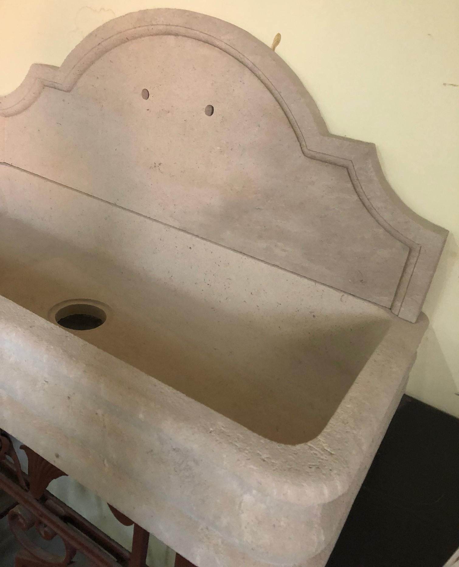 This contemporary limestone sink is the perfect addition to a stylish guest bathroom or a master bath upgrade.

Origin: France.

Measurements:
42 3/4