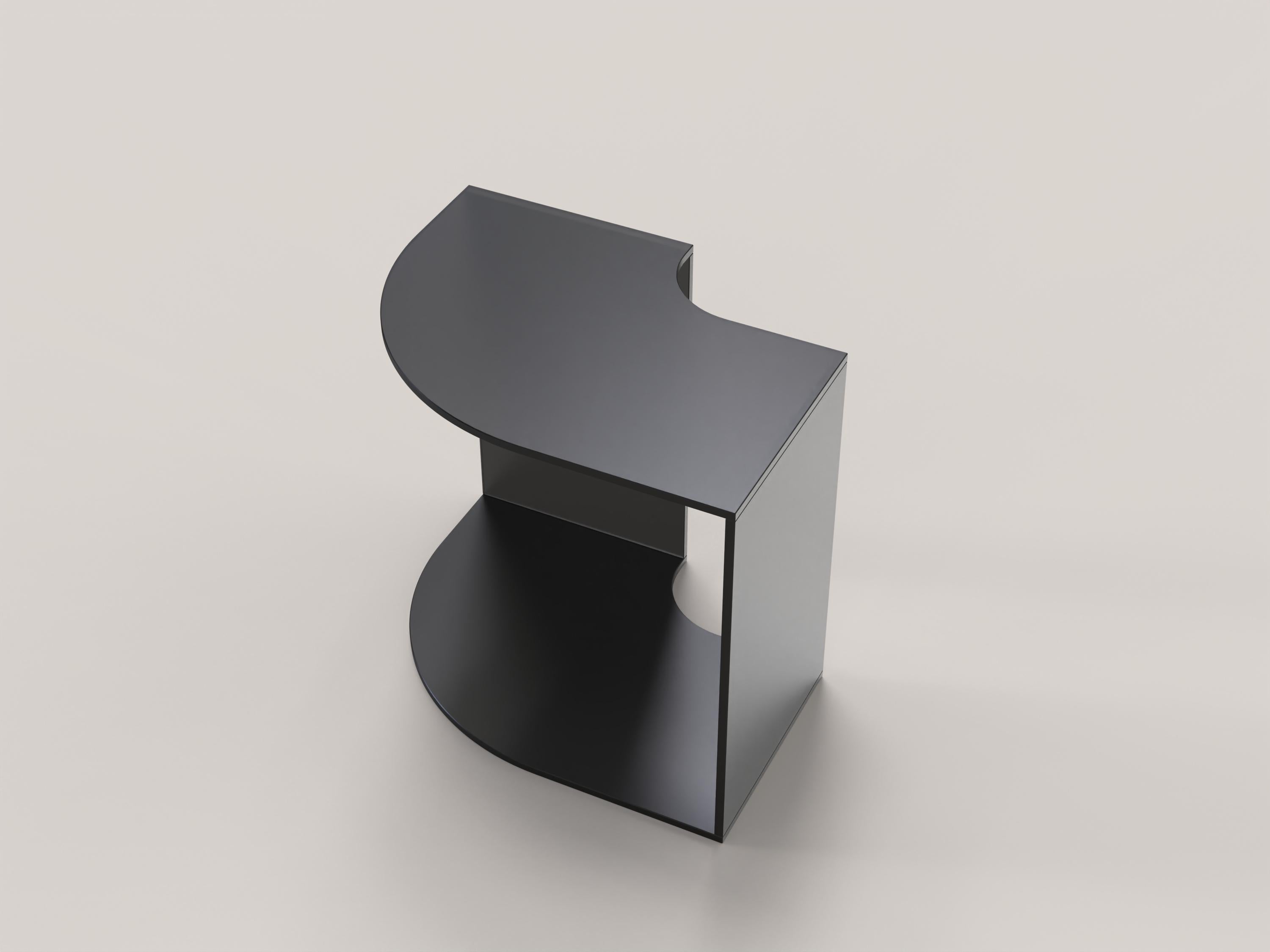 Quarter V1 is a 21st Century side table made by Italian artisans in satin black glass. The piece is manufactured in a limited edition of 1000 signed and progressively numbered examples. It is part of the collectible design language Quarter that has