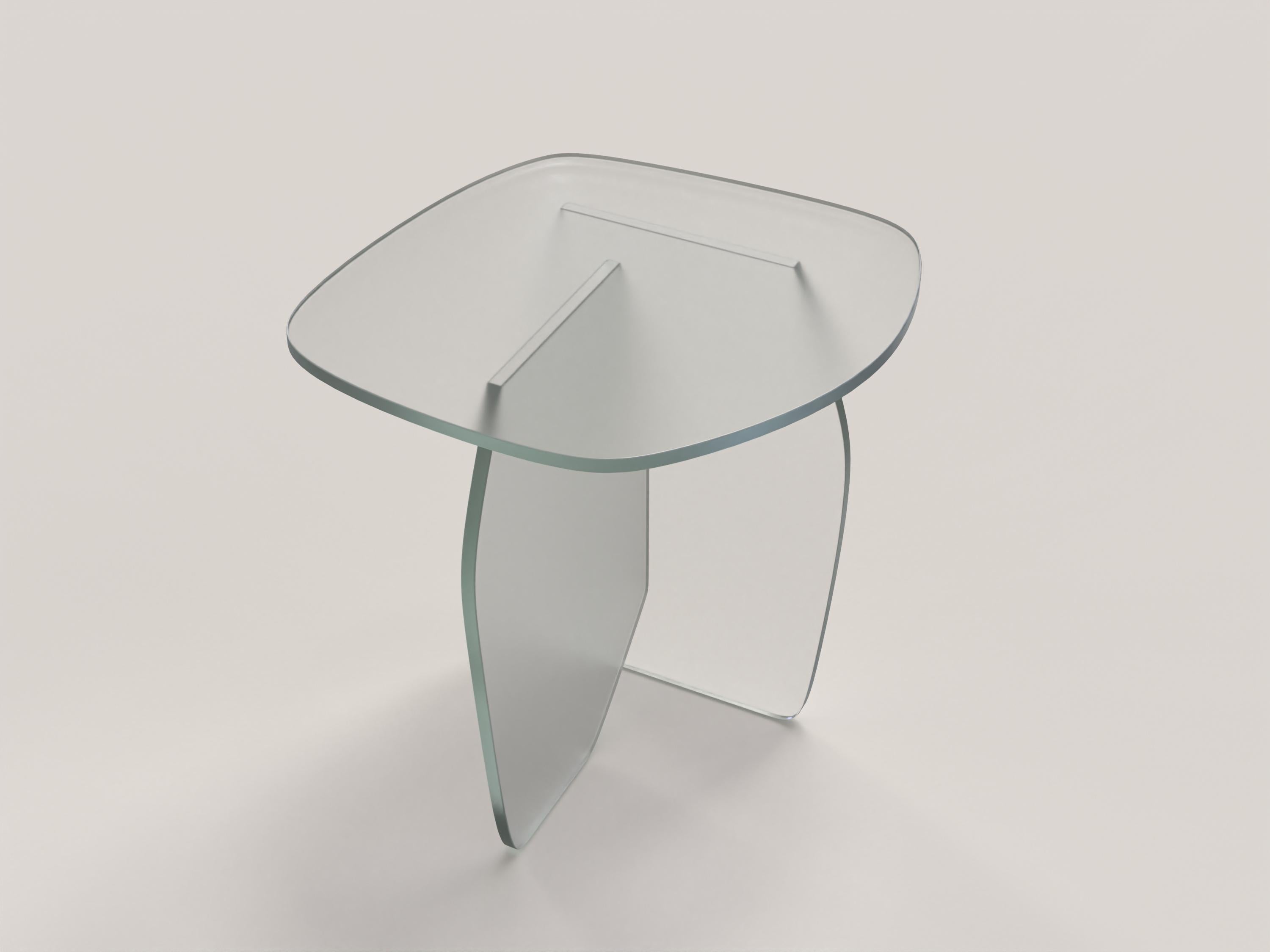 Panorama V1 is a 21st Century side table made by Italian artisans in sanded clear glass. The piece is manufactured in a limited edition of 1000 signed and progressively numbered examples. It is part of the collectible design language Panorama that