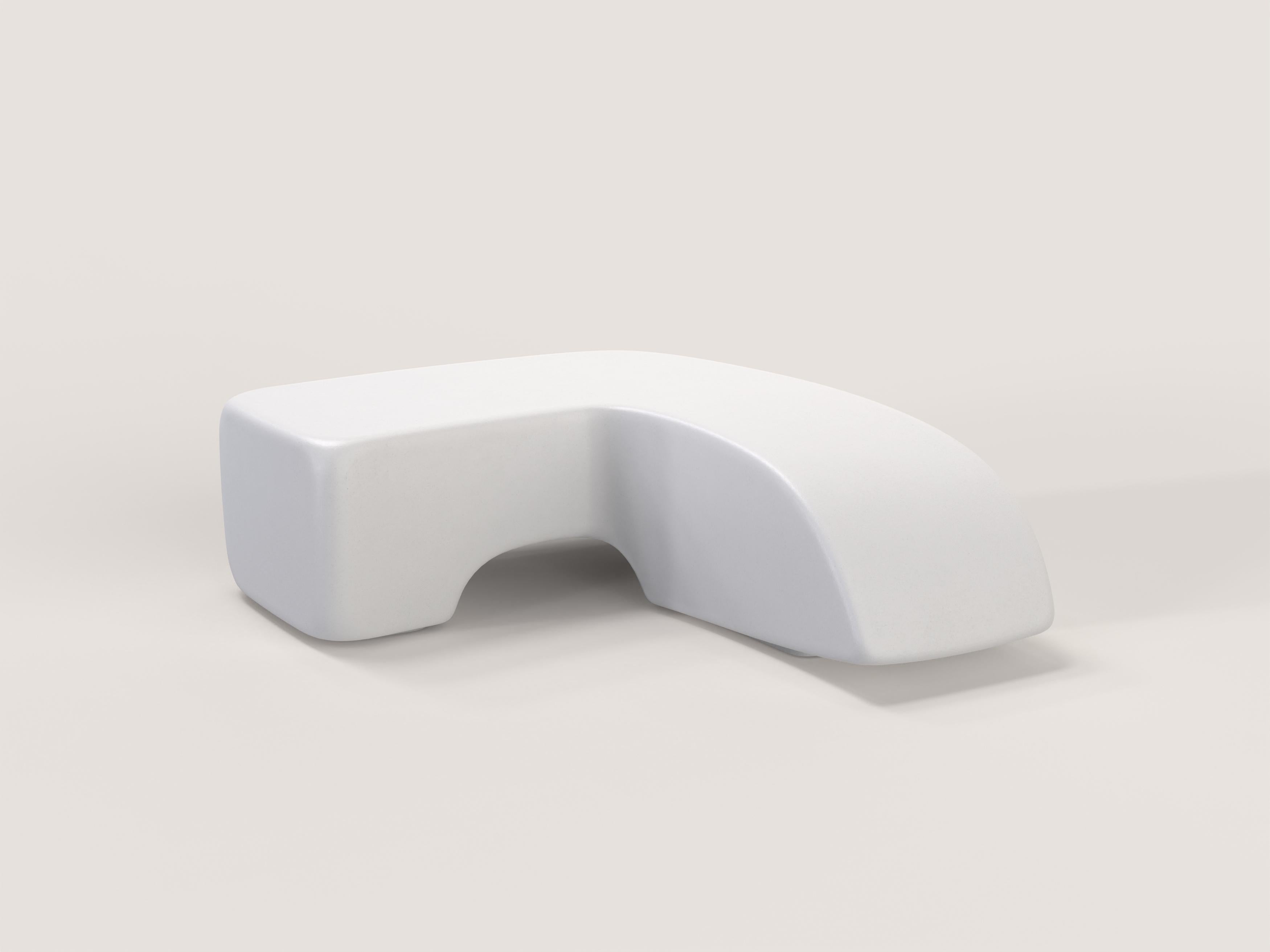 A large volume that seems almost bent and polished by erosion. A smooth and light resin sculpture that seems to be carved out of a large block of stone.
Objects are handcrafted in order to be unique. Limited edition of 150.
Every piece has a marked