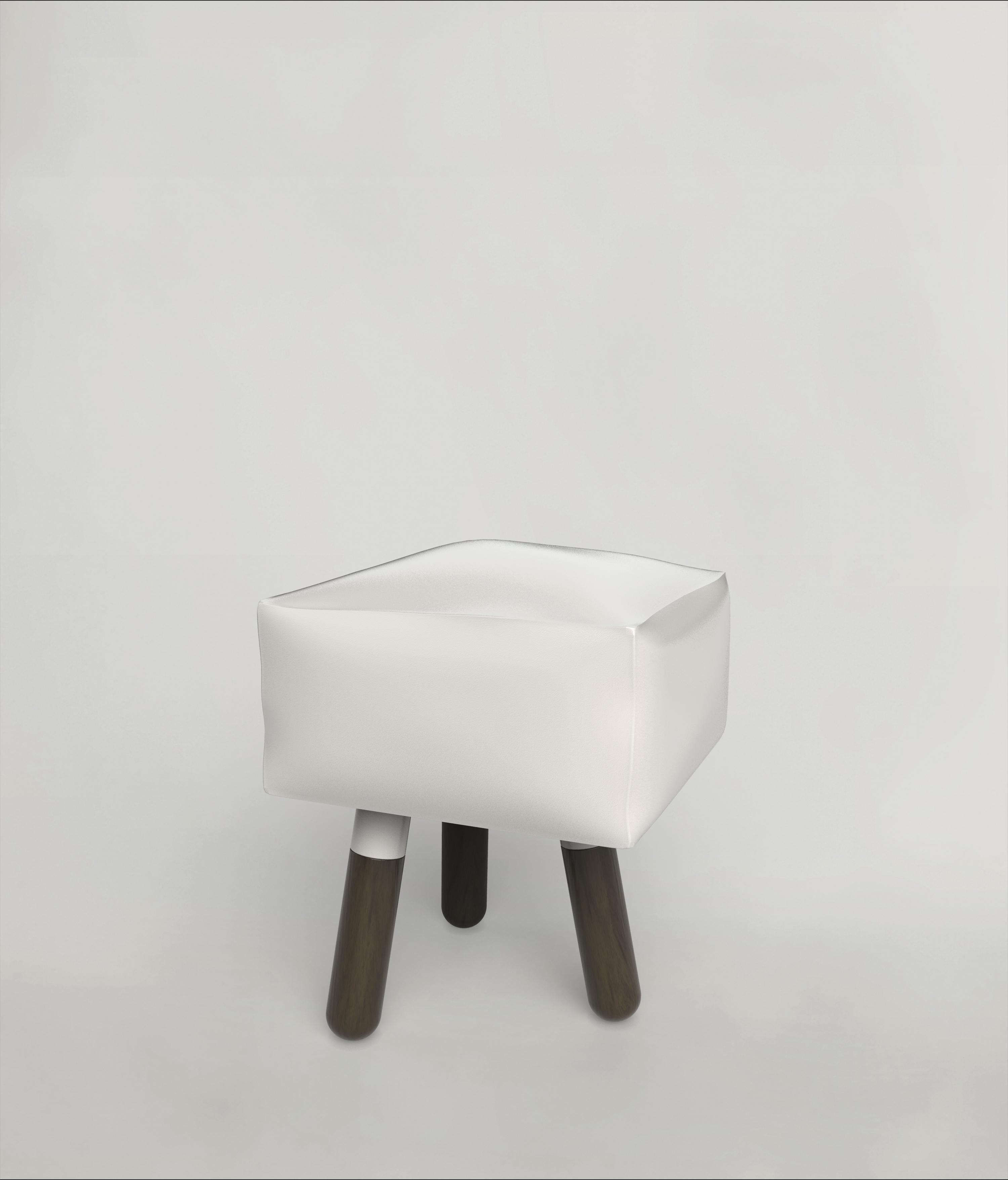 This 21st Century brass stool is a product of Italian craftmanship, the unique effect is created by the expansion of ice within the seating. The stool is part of the collectible design language Icenine that has been developed by the Edizione