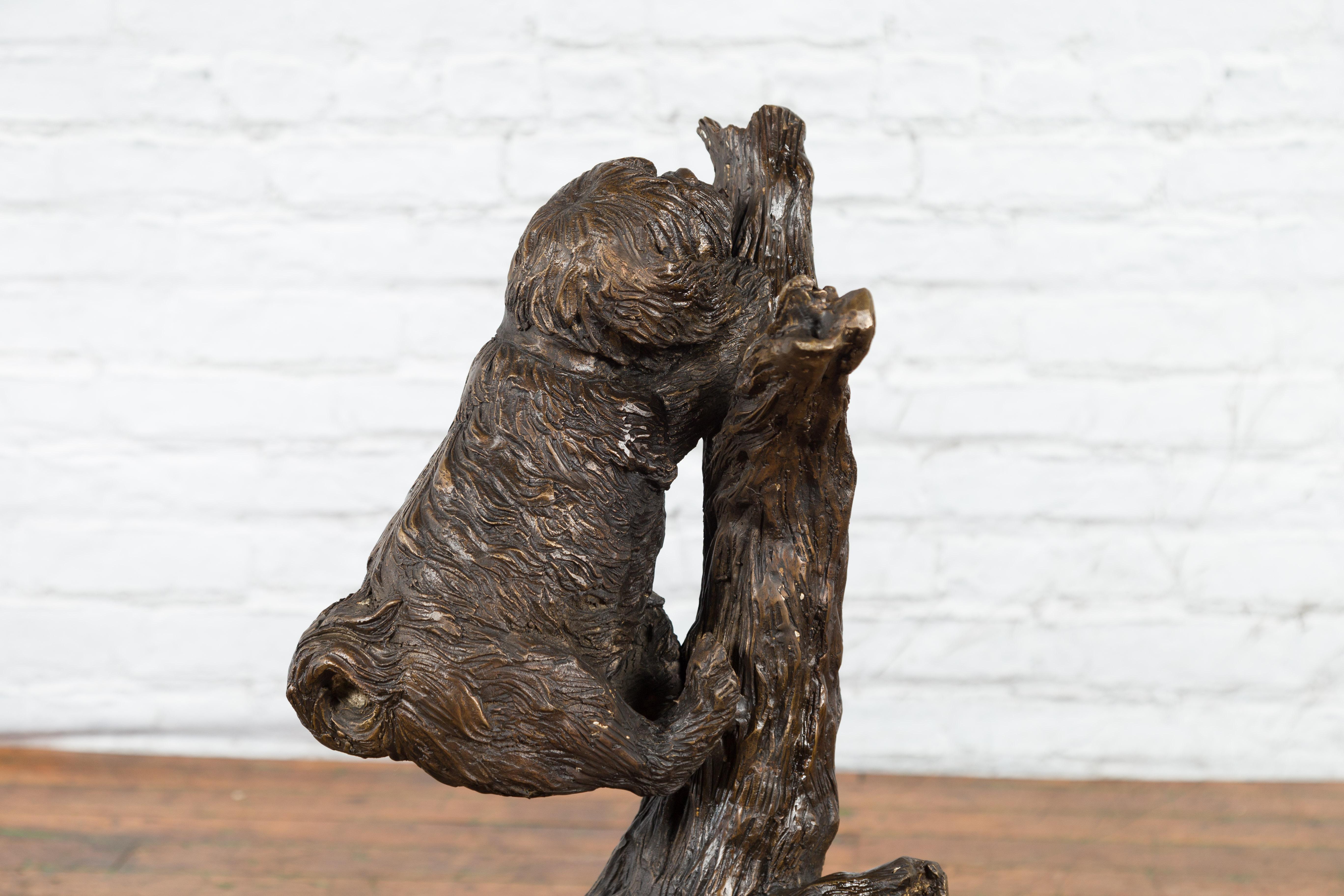 Cast Contemporary Lost Wax Bronze Sculpted Group of Two Dogs Climbing Up a Tree For Sale