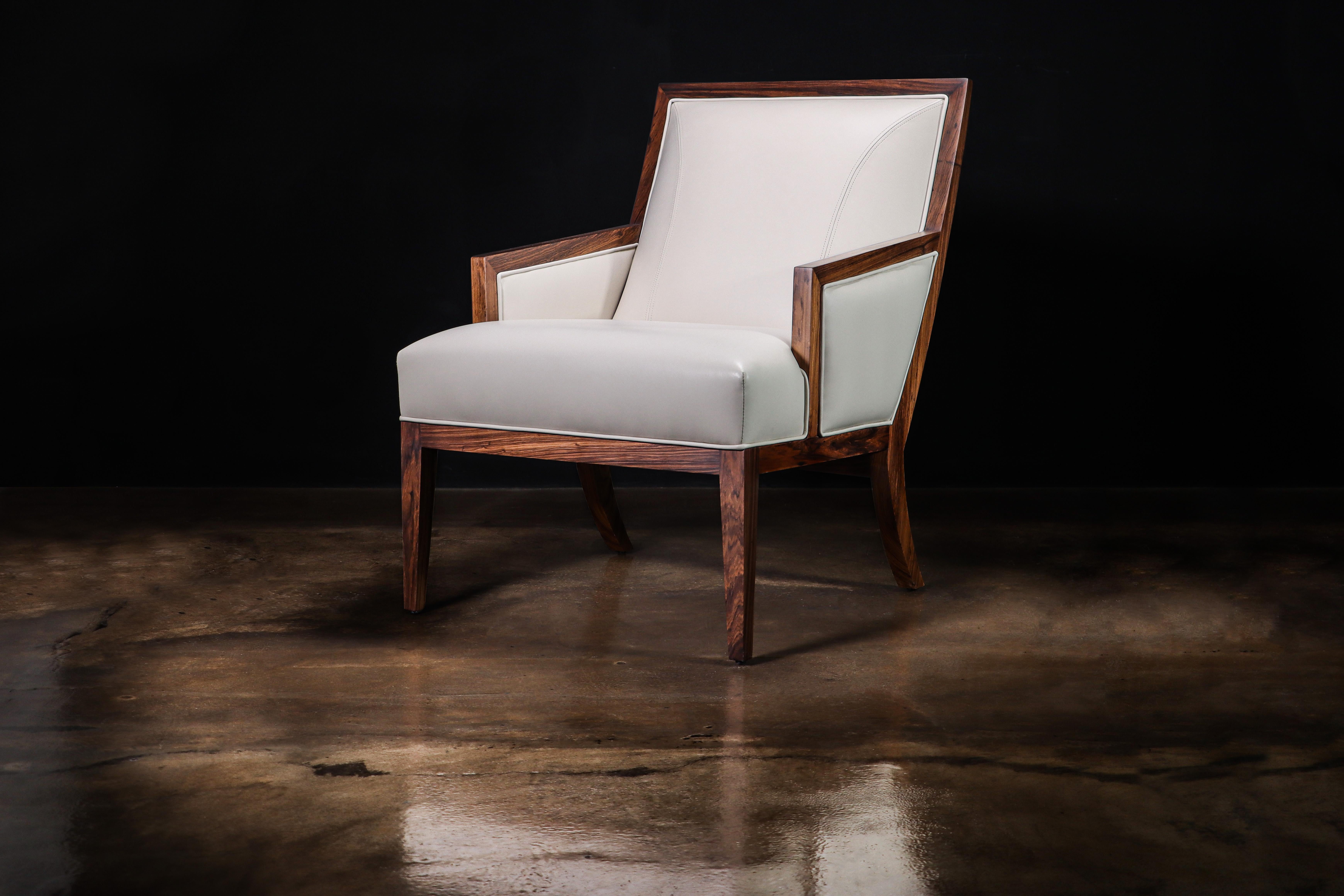 Belgrano Contemporary Lounge Chair in Wood and White Leather from Costantini

Measurements are: 27” W x 35” D x 36” H x 18” SH

The Belgrano Lounge Chair is inspired by mid-20th century modernist design. It features a decorative stich detail