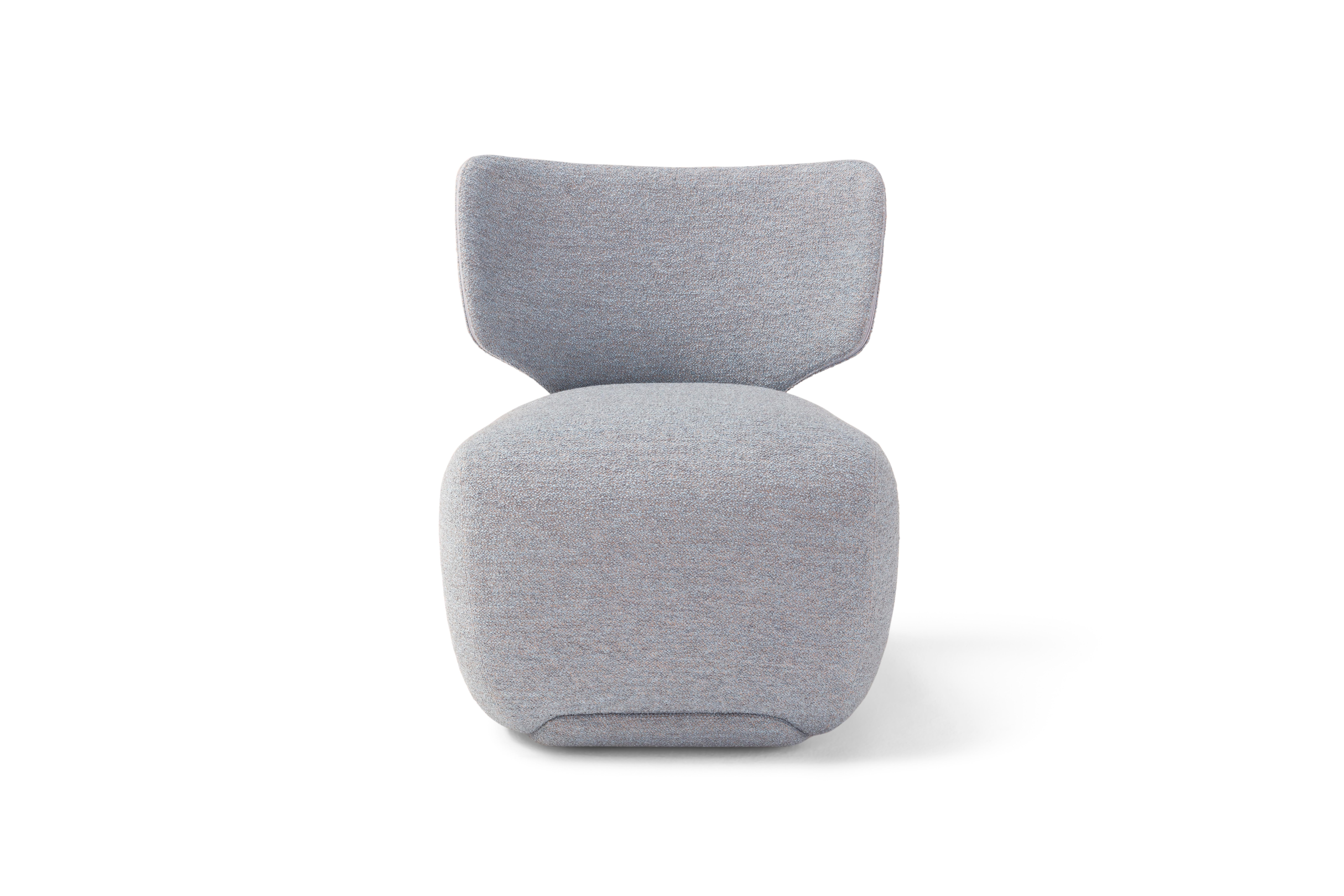 'NOA' is a compact and vert elegant lounge chair showcasing a generous seat and curved backrest. 
Designer: Stefano Bigi
Maker: Amura Lab 
Fabric shown on main image: Ortisei col.15

Softness is the main feature of Noa, so full and florid that