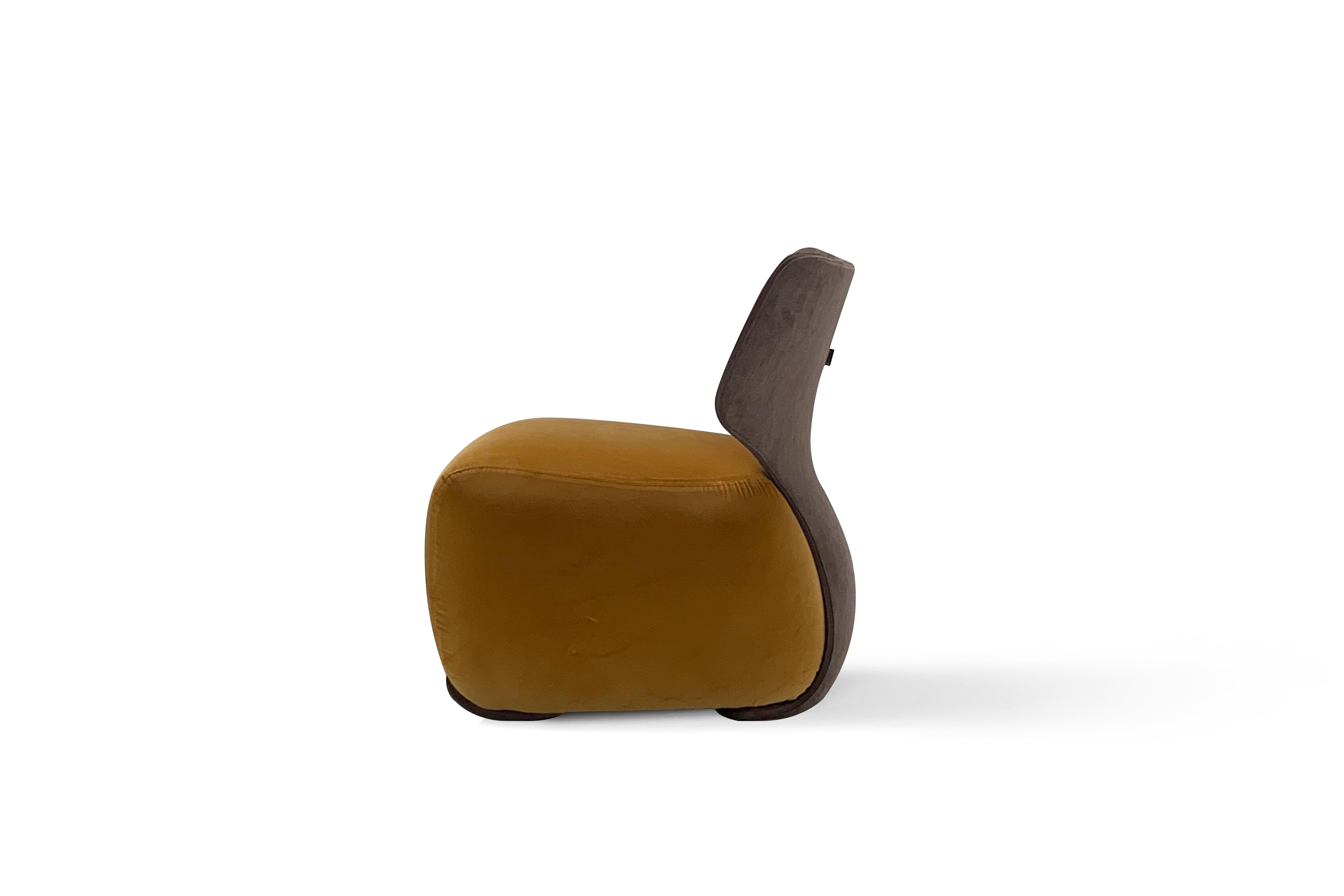 'NOA' is a compact and vert elegant lounge chair showcasing a generous seat and curved backrest. 
Designer: Stefano Bigi
Maker: Amura Lab 
Fabric shown on main image: Nobilis col.40 + Galba col.123

Softness is the main feature of Noa, so full and