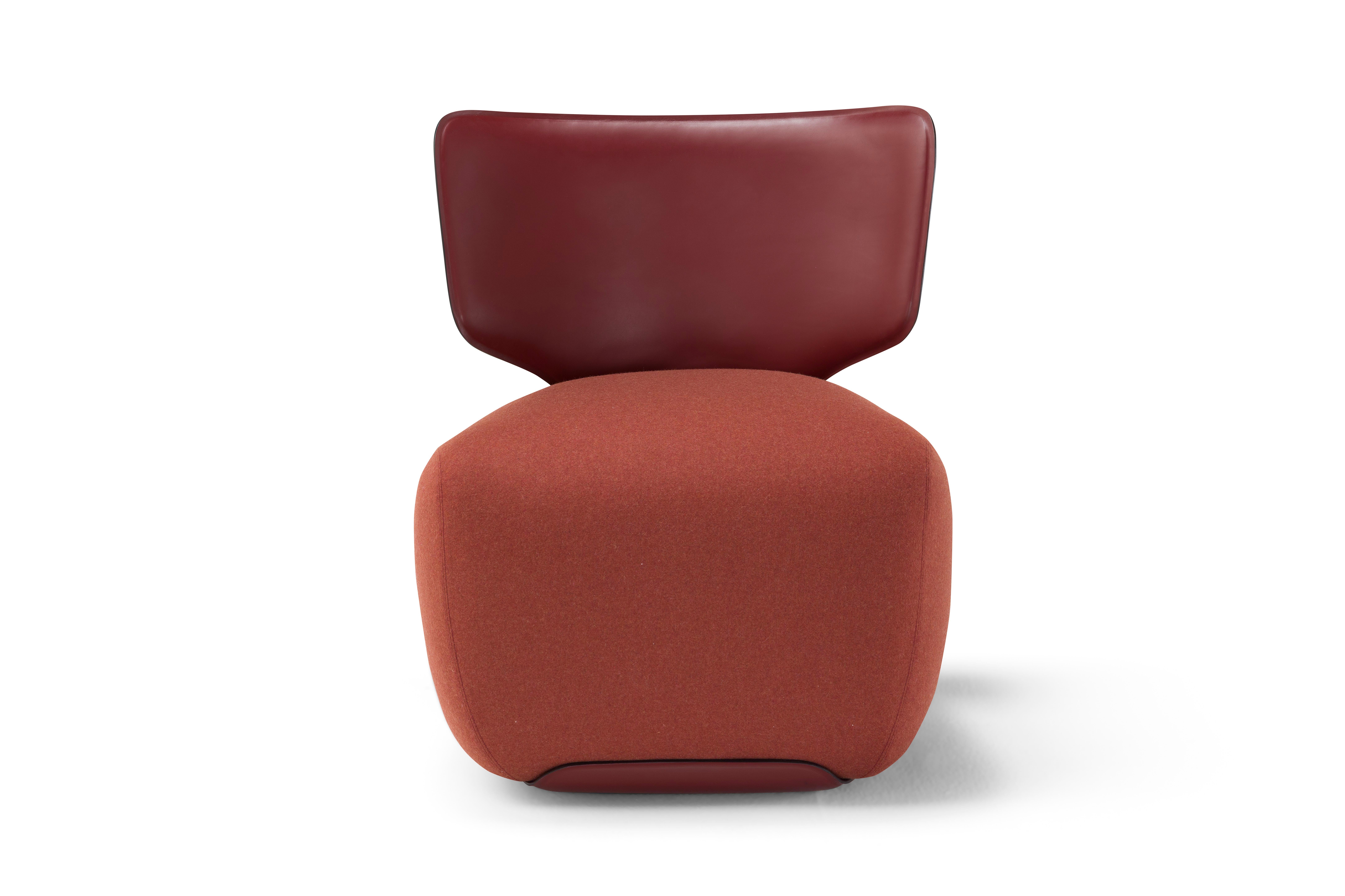 'NOA' is a compact and vert elegant lounge chair showcasing a generous seat and curved backrest. 
Designer: Stefano Bigi
Maker: Amura Lab 
Fabric shown on main image: St Moritz col.067 for the seat + Cuoio leather col15 for the back

Softness is the
