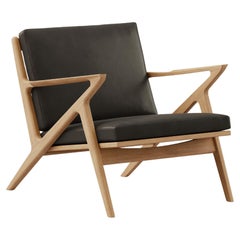Moderner Loungesessel 'Z-Chair' von DK3, Öl-Eiche, schwarzes Leder