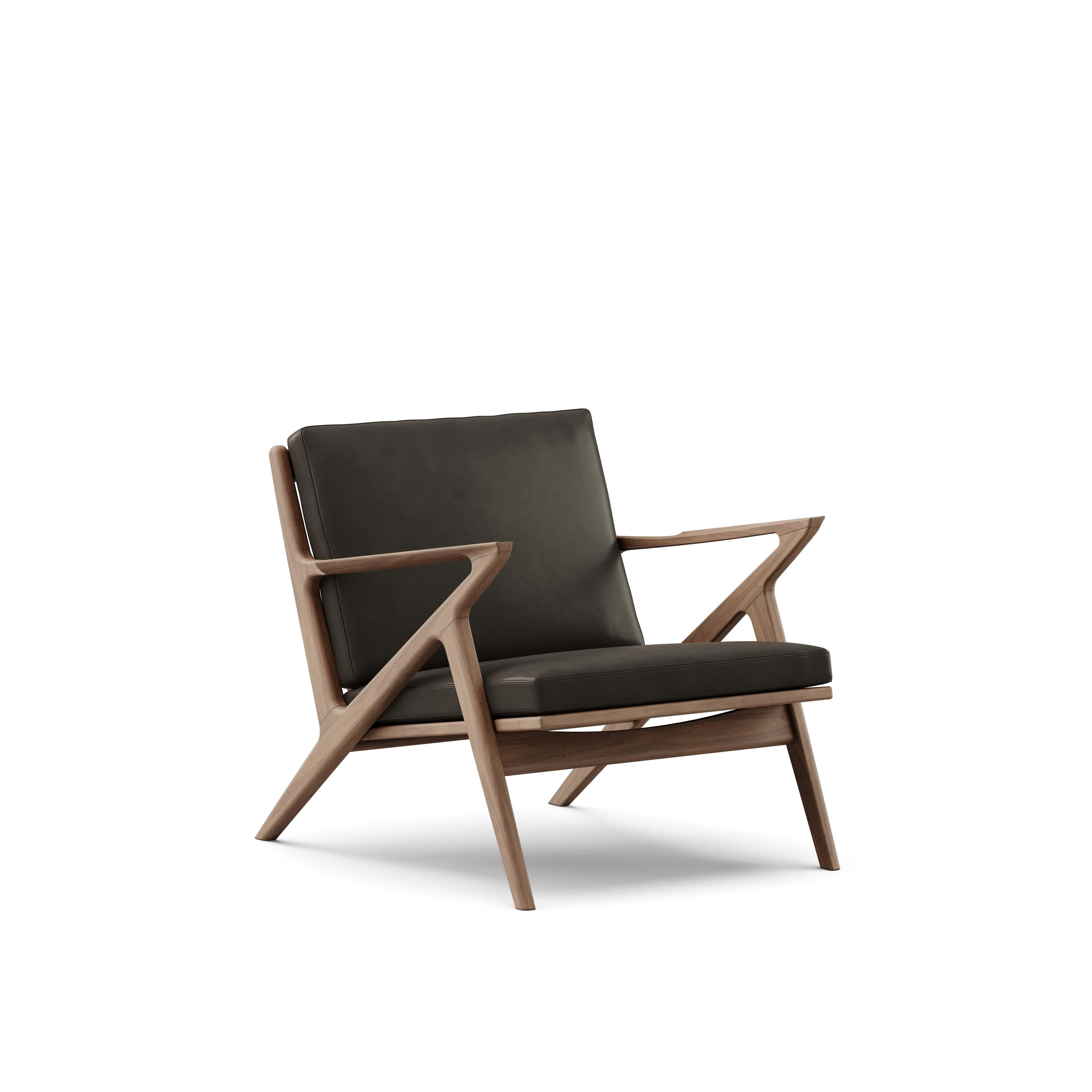 Contemporary Lounge Chair 'Z-Chair' by DK3
Designed by Poul Thorsbjerg Jensen

Dimensions: 
- W.75 x D.82 x H.62 cm
- Seating: W.58 x D.52 x H.36 cm

Materials: 
- Frame: Solid wood.
- Seat and back: Upholstery.

Model shown on main picture:
-