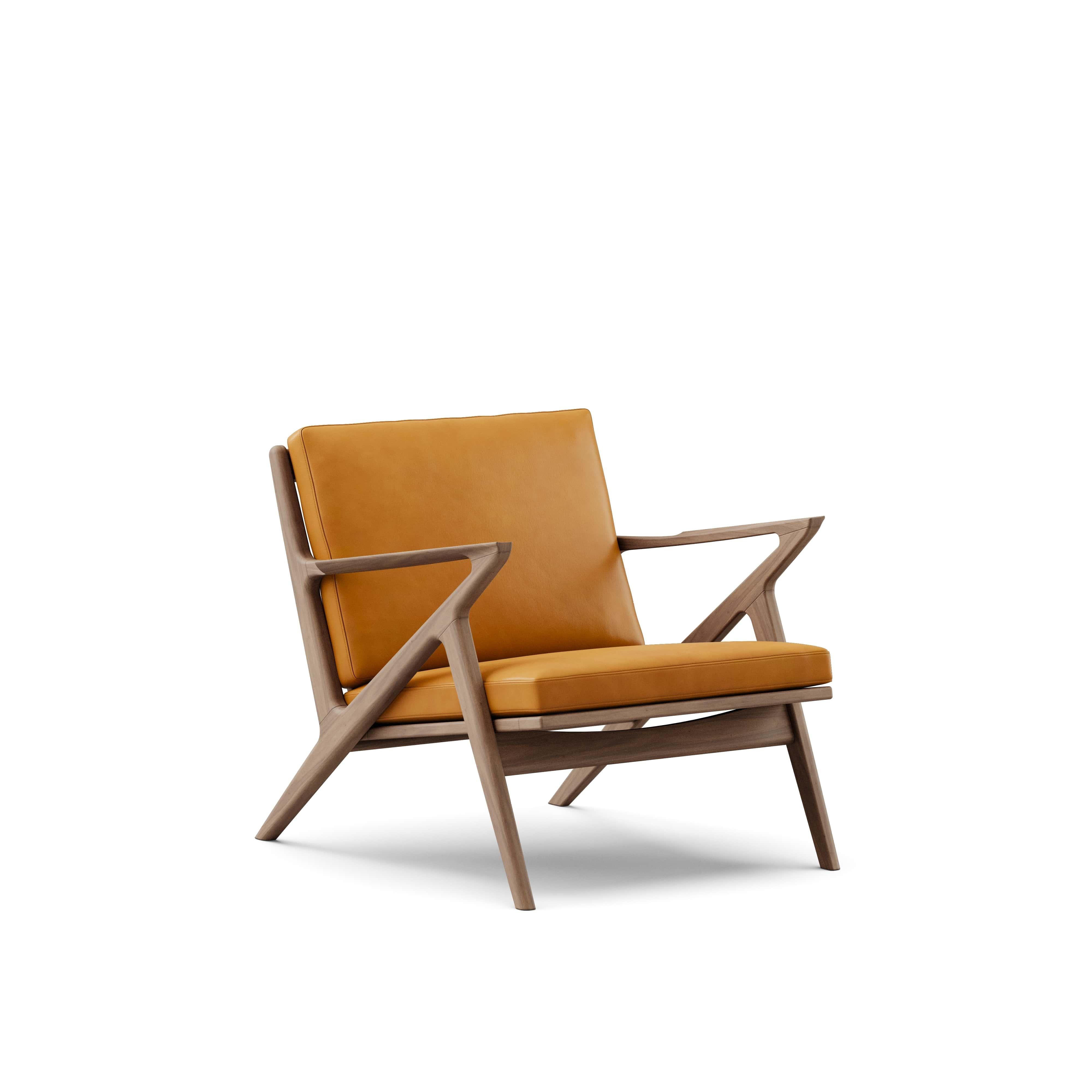 Contemporary Lounge Chair 'Z-Chair' by DK3
Designed by Poul Thorsbjerg Jensen

Dimensions: 
- W.75 x D.82 x H.62 cm
- Seating: W.58 x D.52 x H.36 cm

Materials: 
- Frame: Solid wood.
- Seat and back: Upholstery.

Model shown on main picture:
-