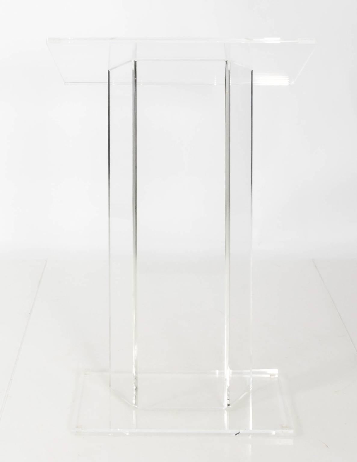 Contemporary Lucite podium in a glossy finish, circa 1980s.