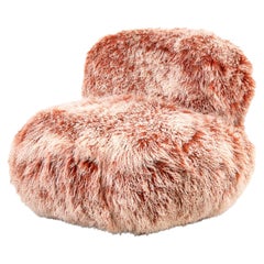 Sillón de cuna contemporáneo con piel de Mongolia roja. Fabricado en Italia por Hessentia