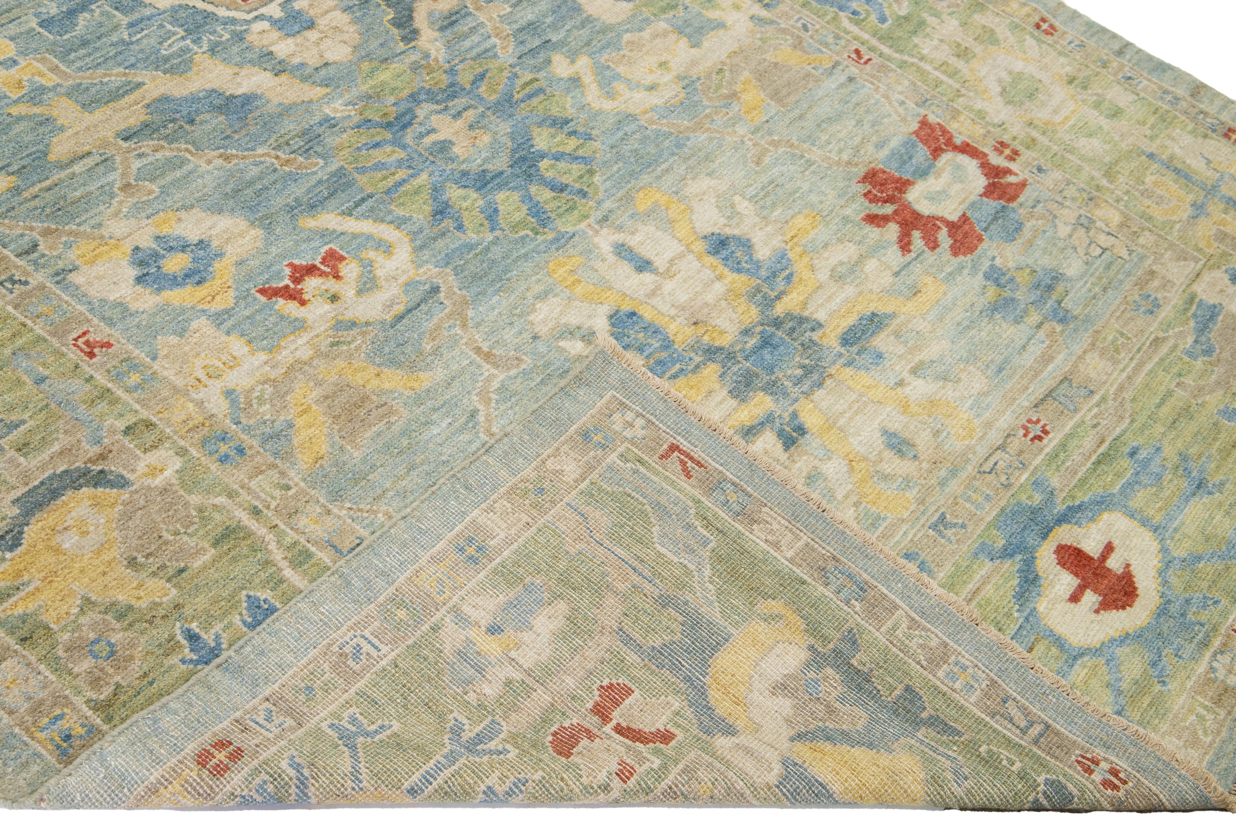 Beautiful modern Mahal hand-knotted wool runner with a blue field. This Piece has a green-designed frame and multicolor accent colors in a gorgeous all-over Classic floral design.

This rug measures: 6'8