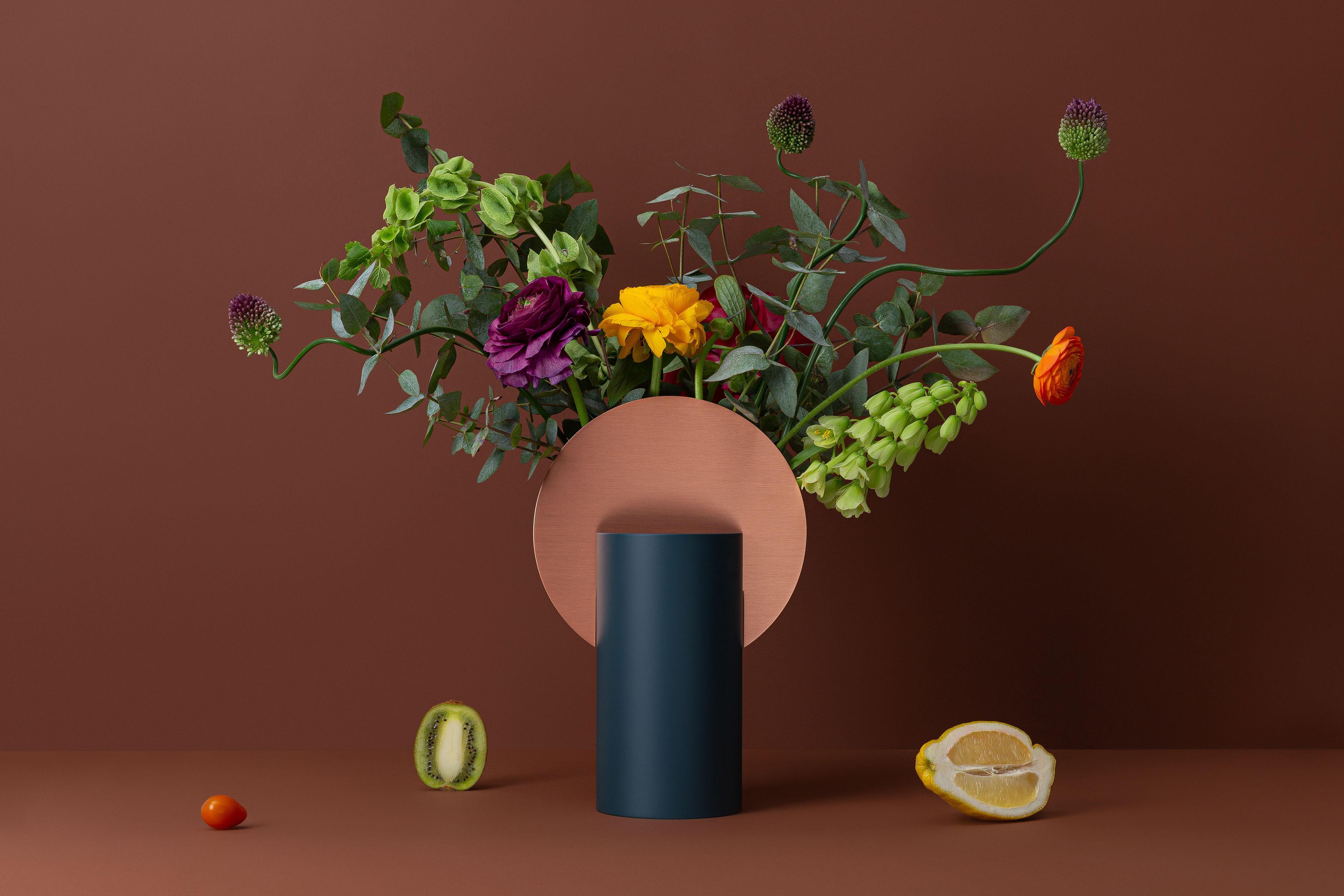 Brand: NOOM
Designer: Kateryna Sokolova
Materials: Copper, painted steel
Color scheme: CS5 - pigeon blue and copper
Dimensions: H 28.5 cm x W 19 cm x D 10 cm
Net Weight: 1.6 kg.

Malevich vase, one of the vases from the 