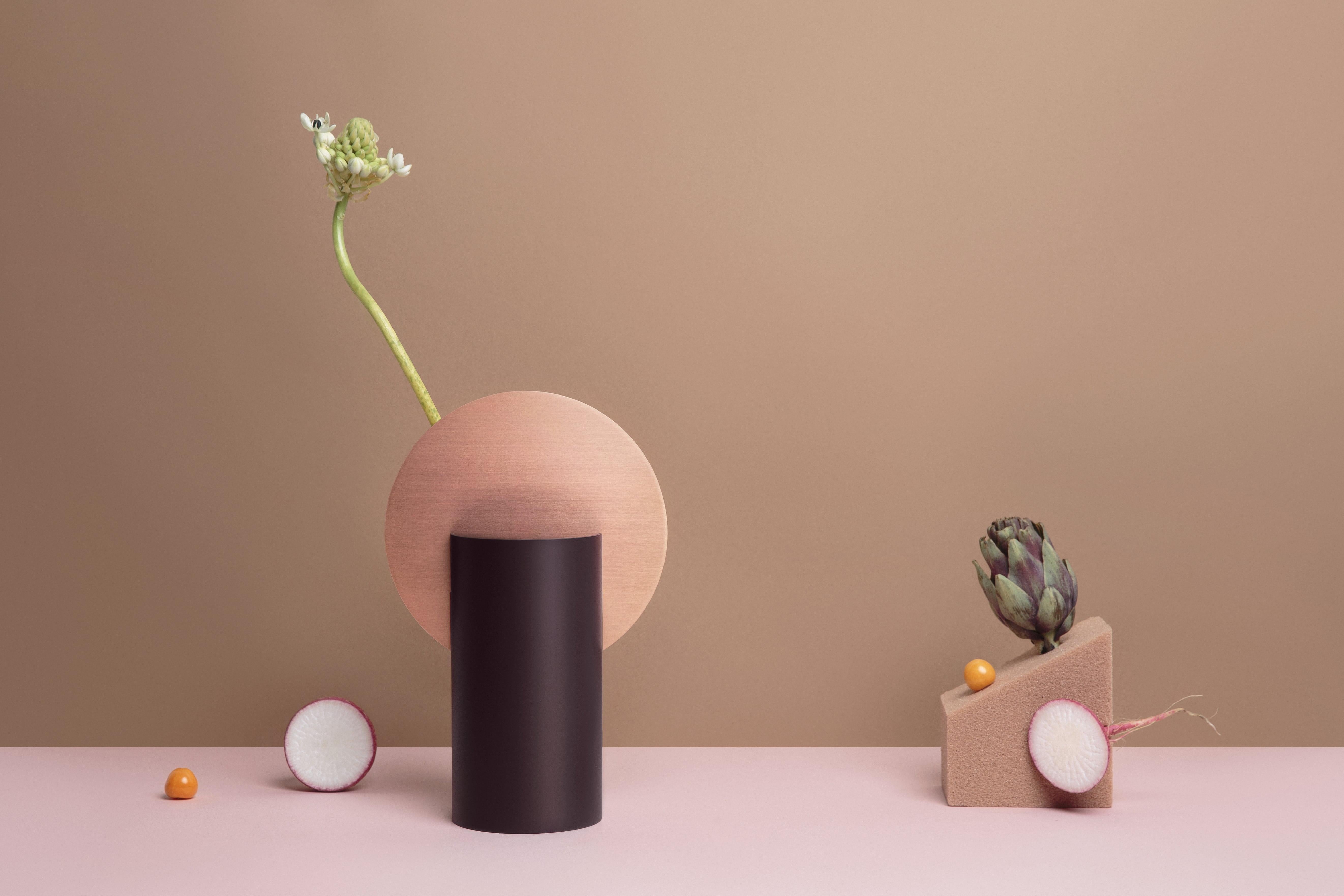 Brand: NOOM
Designer: Kateryna Sokolova
Materials: Copper, painted steel
Color scheme: CS7 - sangria red and copper
Dimensions: H 28.5 cm x W 19 cm x D 10 cm
Net Weight: 1.6 kg.

Malevich vase, one of the vases from the 