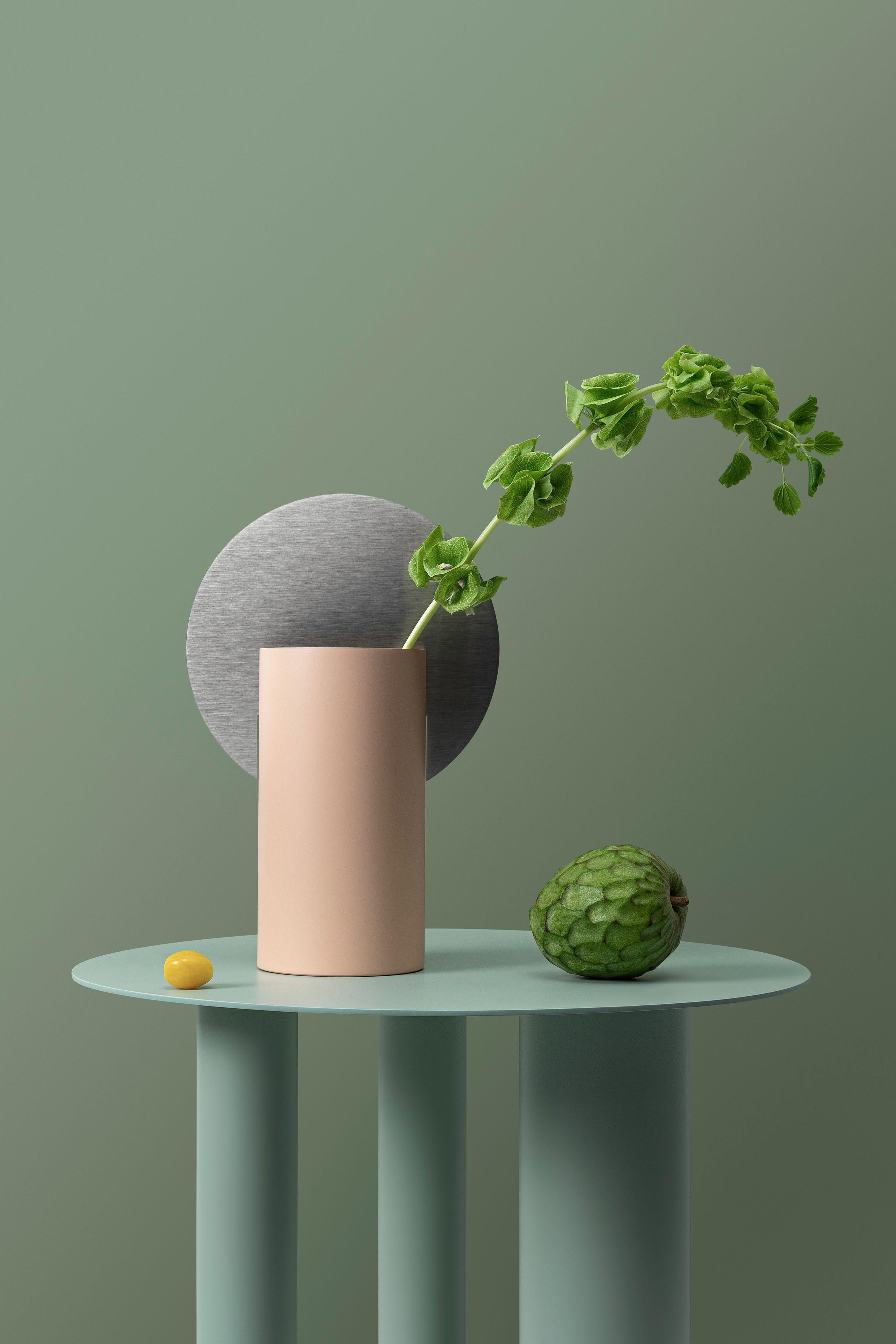 Brand: NOOM
Designer: Kateryna Sokolova
Materials: Brushed stainless steel, painted steel
Color scheme: CS8 - powder pink and stainless steel
Dimensions: H 28.5 cm x W 19 cm x D 10 cm
Net Weight: 1.6 kg.

Malevich vase, one of the vases from the